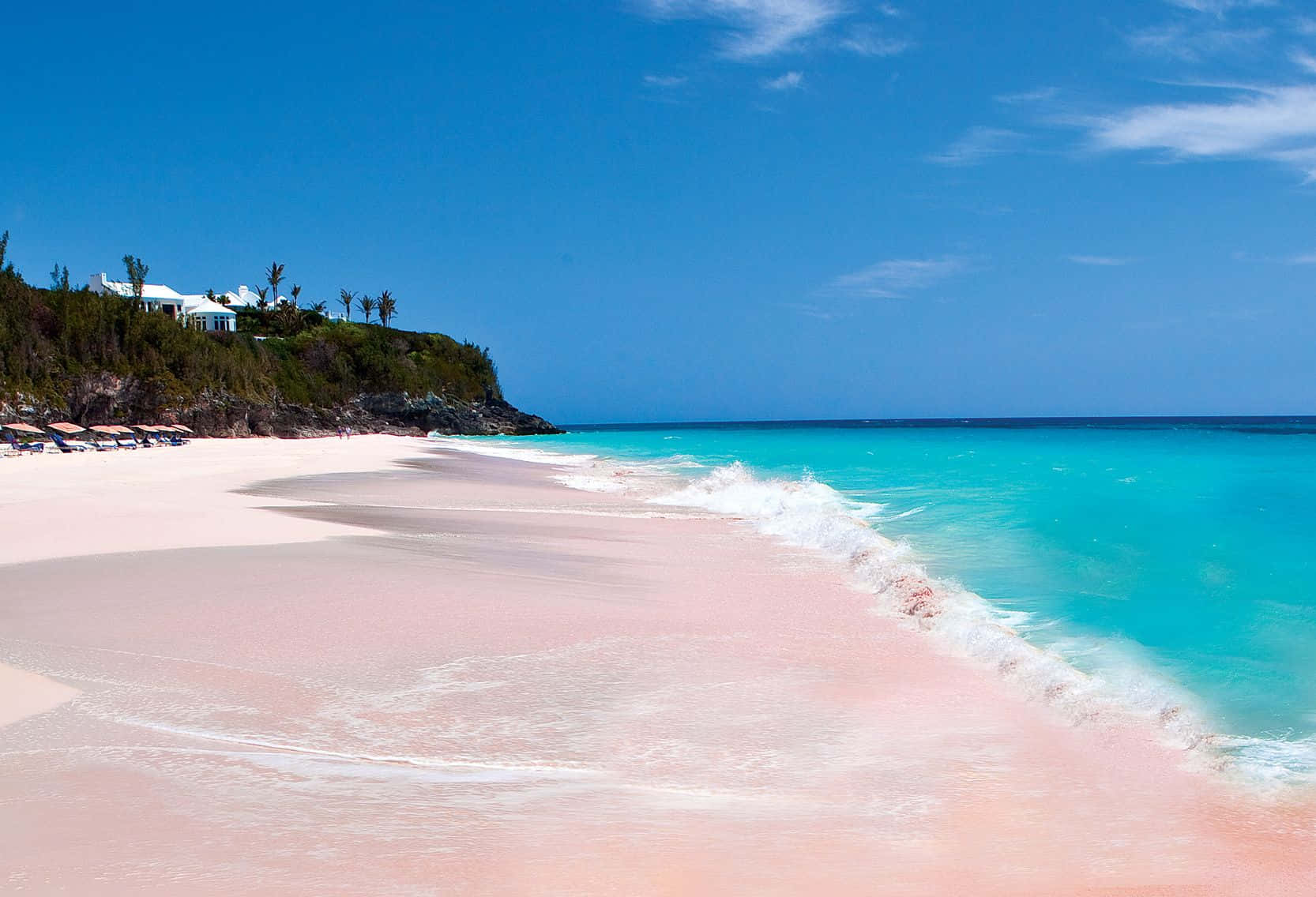 Breathtaking Pink Sand Beach at Sunset Wallpaper