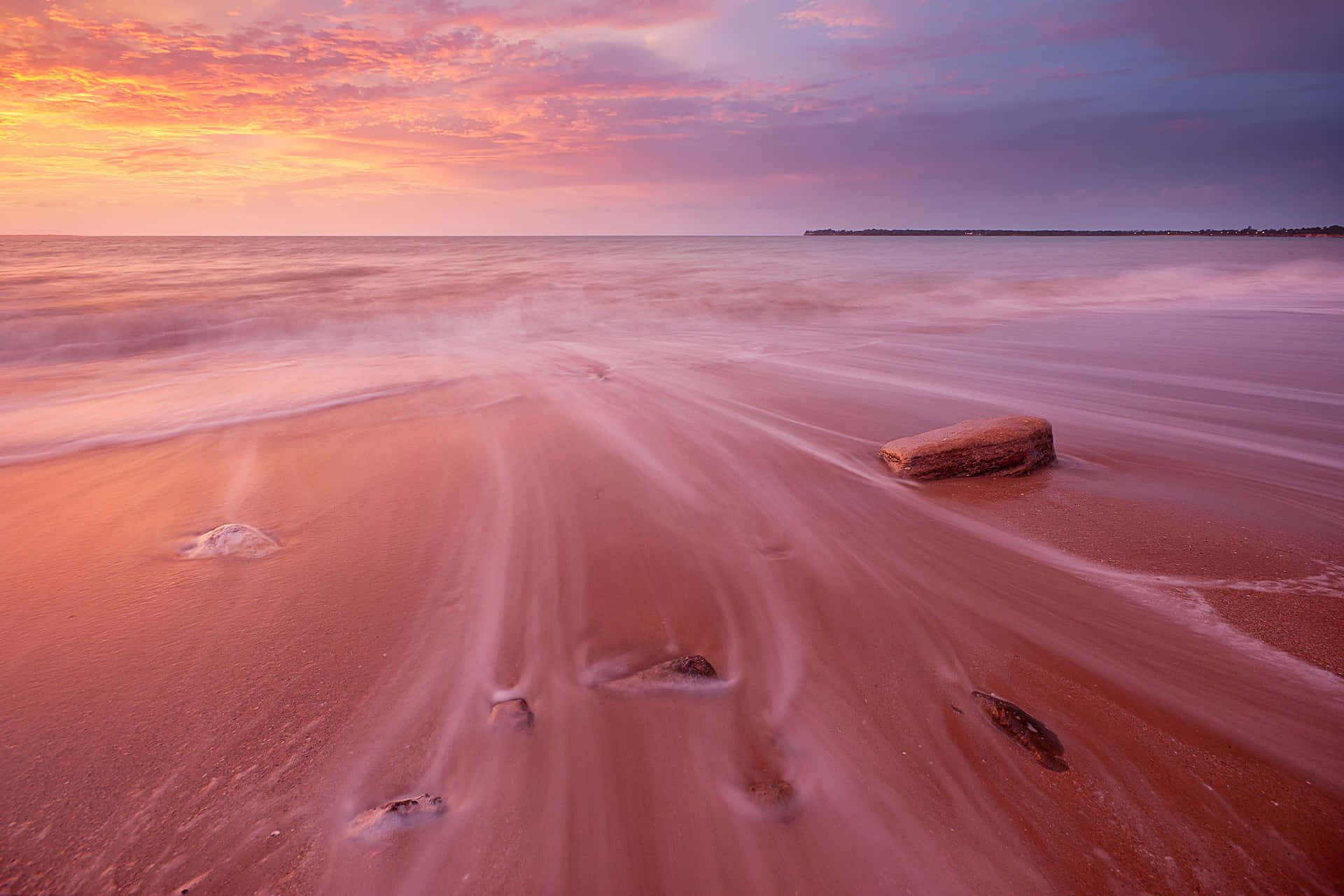 Experience the Beauty of Pink Sand Beach Wallpaper