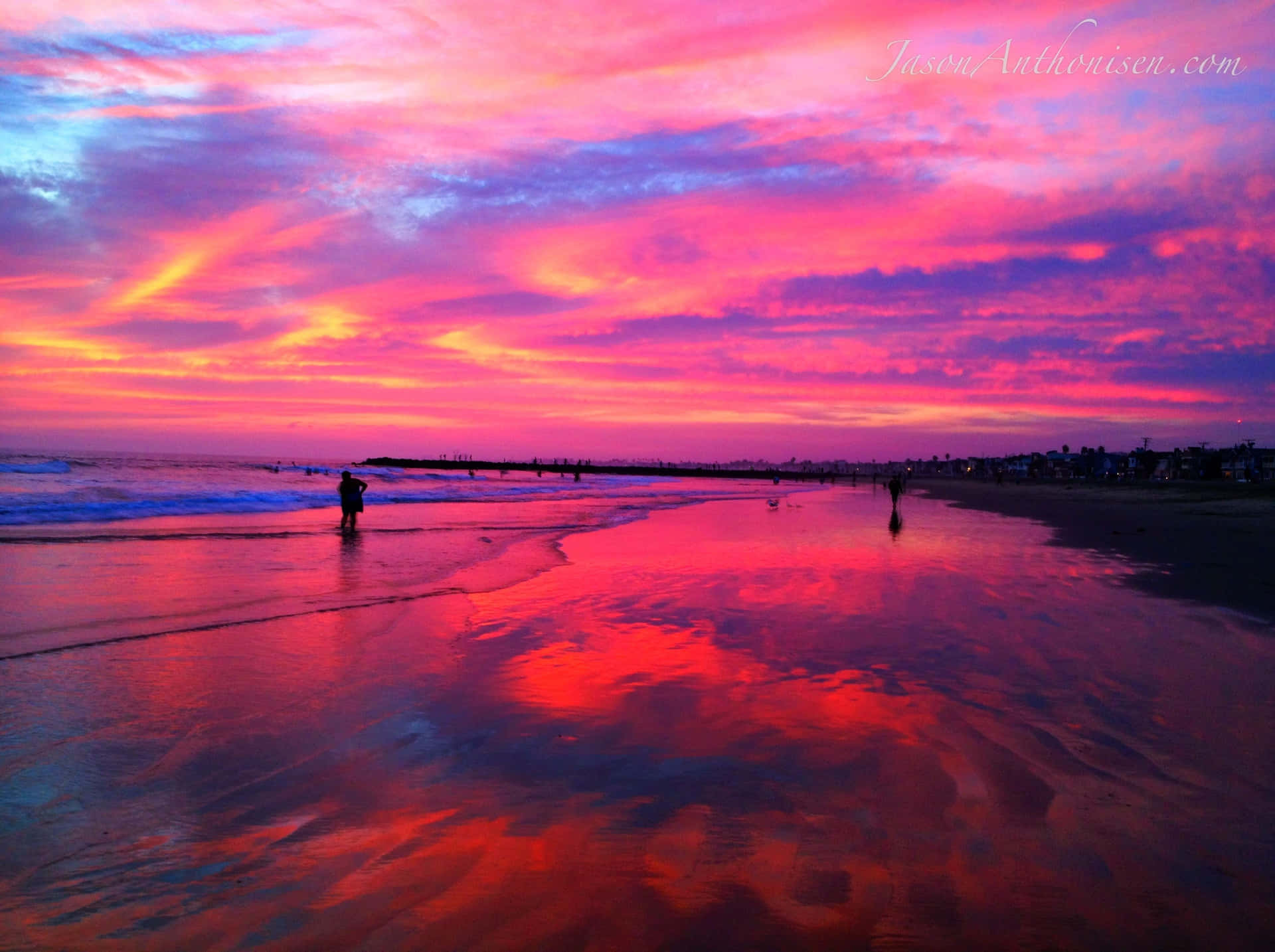 Stunning Pink Sand Beach at Sunset Wallpaper