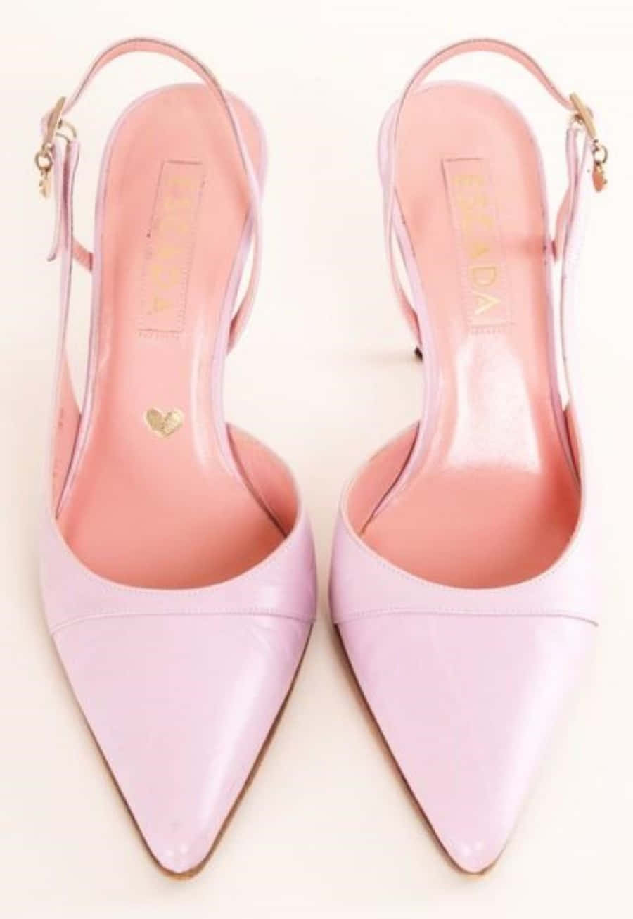 Captivating Pink Shoes on a Dark Background Wallpaper