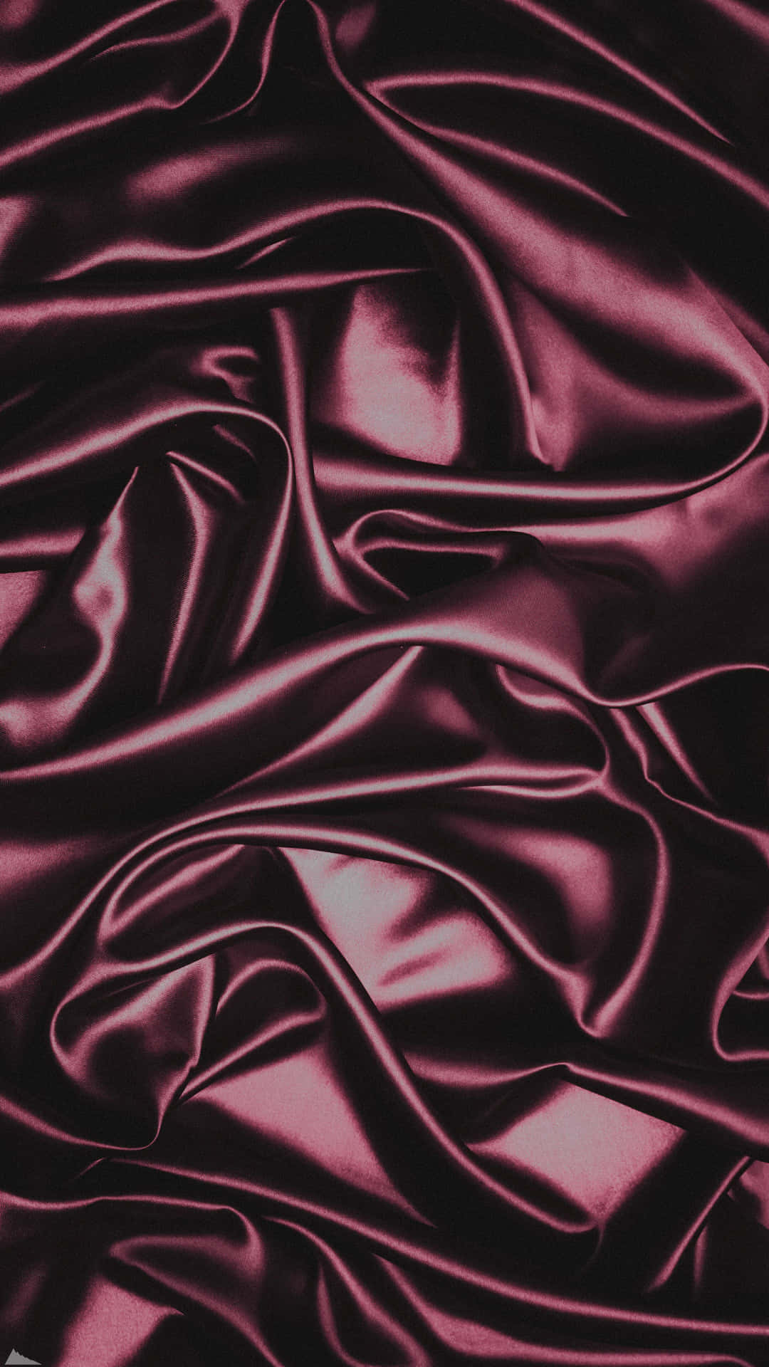 A Close Up Of A Burgundy Satin Fabric Wallpaper