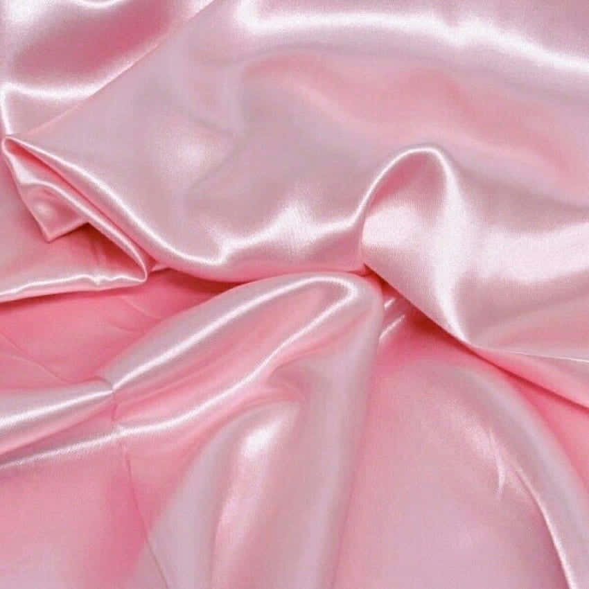 Enjoy the Soft Beauty of a Pink Silk Aesthetic Wallpaper