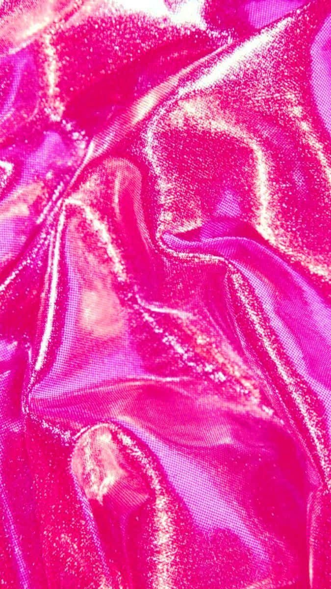 A Close Up Of A Pink Shiny Fabric Wallpaper
