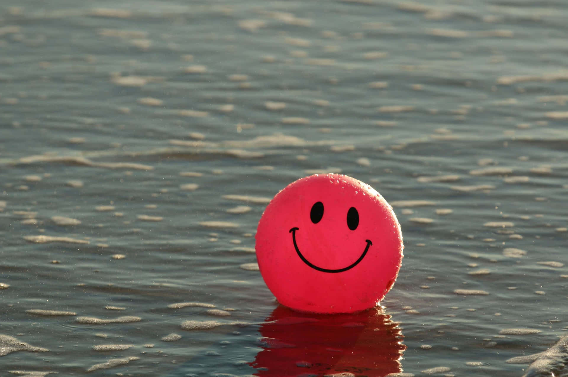Pink Smiley Face Balloonon Water.jpg Wallpaper