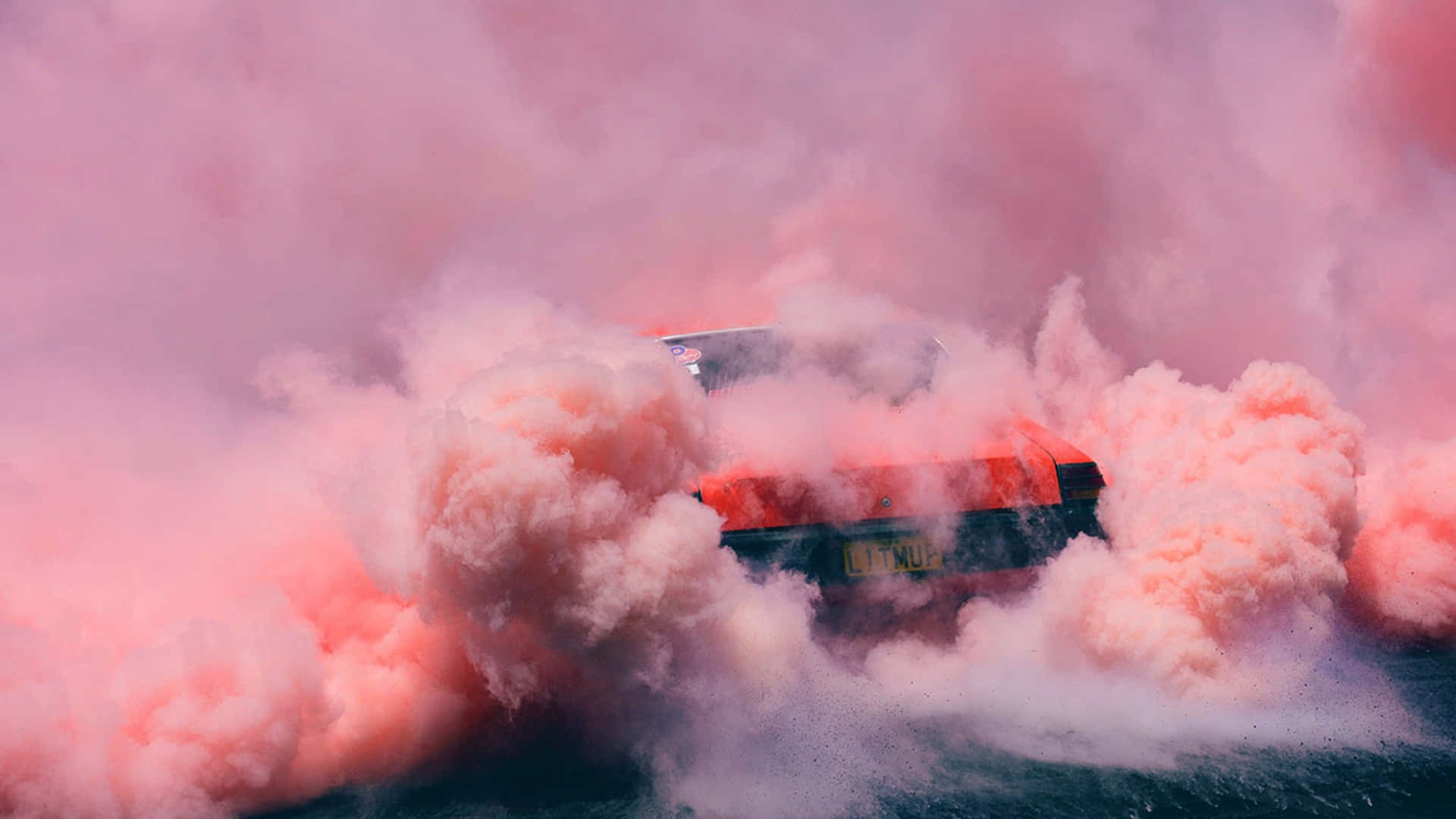 Pink Smoke Coming Out Of A Car