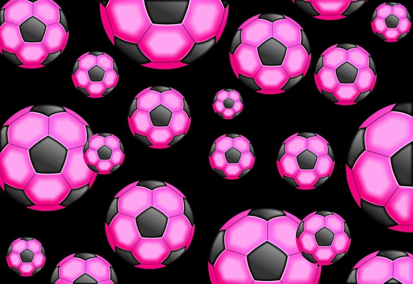 Unvibrante Balón De Fútbol Rosa En Un Campo De Hierba Fondo de pantalla