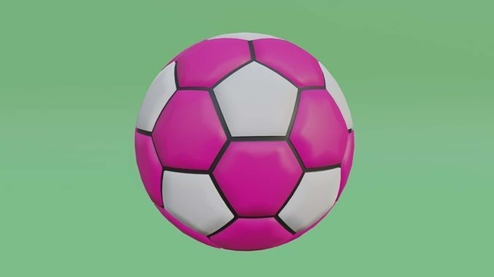 Caption: A vibrant pink soccer ball shining on the field Wallpaper