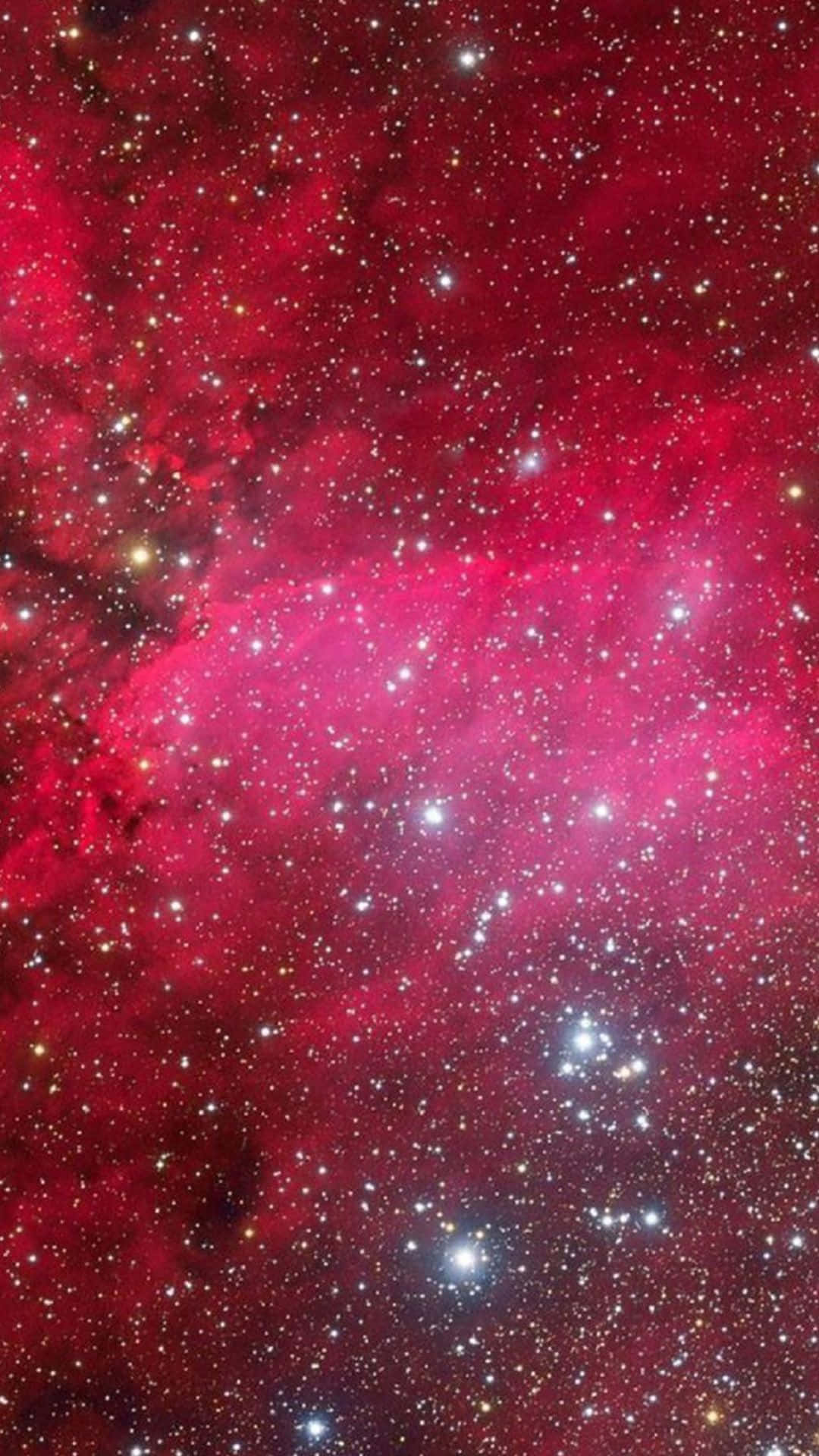 En smuk udsigt til Pink Space, en livlig nebulosa af pink og hvide galakser Wallpaper
