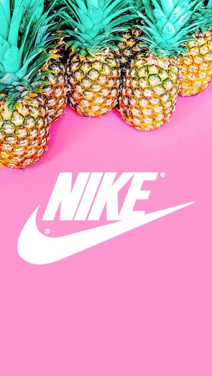 Nike Pineapples On A Pink Background Wallpaper