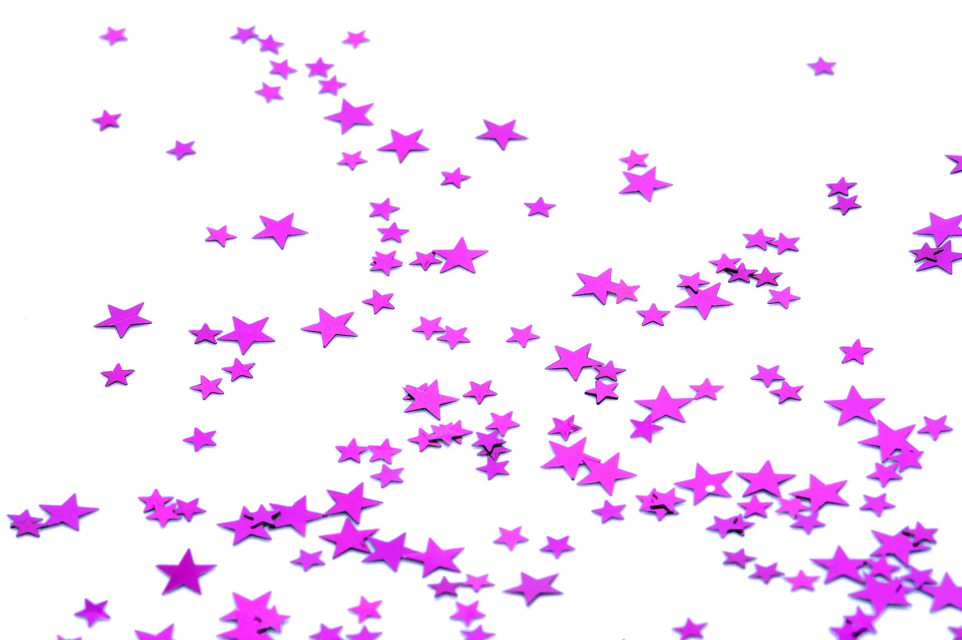 Enchanting Pink Stars in the Night Sky Wallpaper
