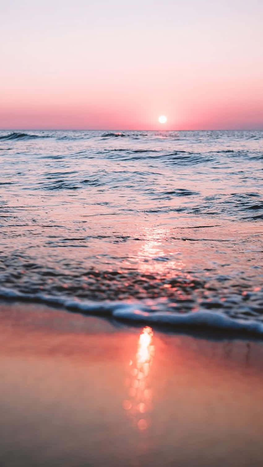 Pink Sunset Beach Waves Wallpaper