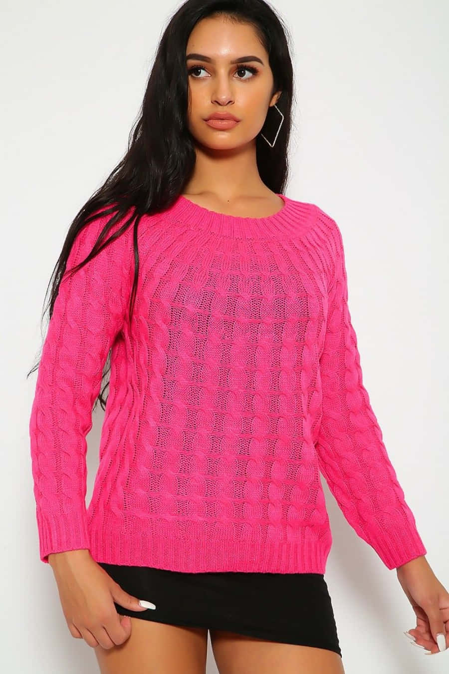 Stylish Woman Wearing a Cozy Pink Sweater Wallpaper