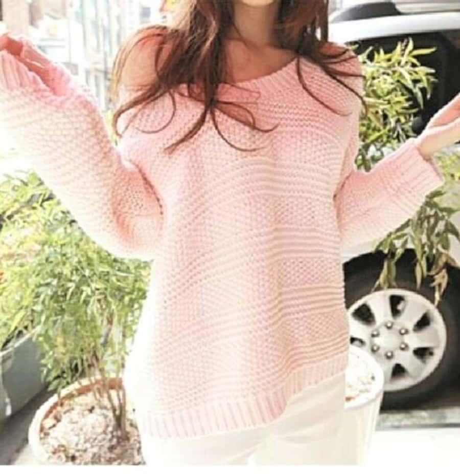 Download Cozy Pink Sweater on a Hanger Wallpaper | Wallpapers.com