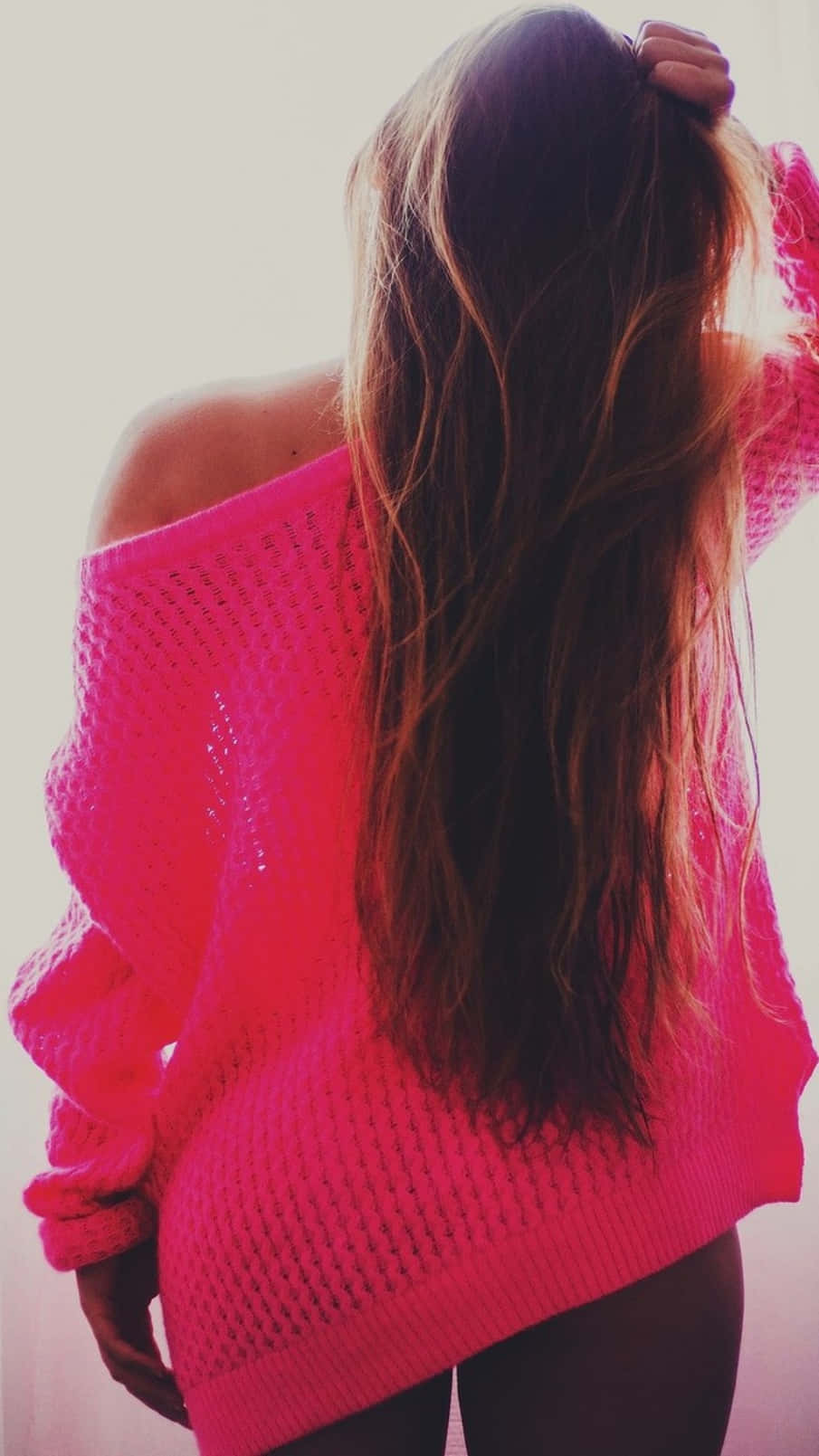 Cozy Pink Sweater on White Hanger Wallpaper