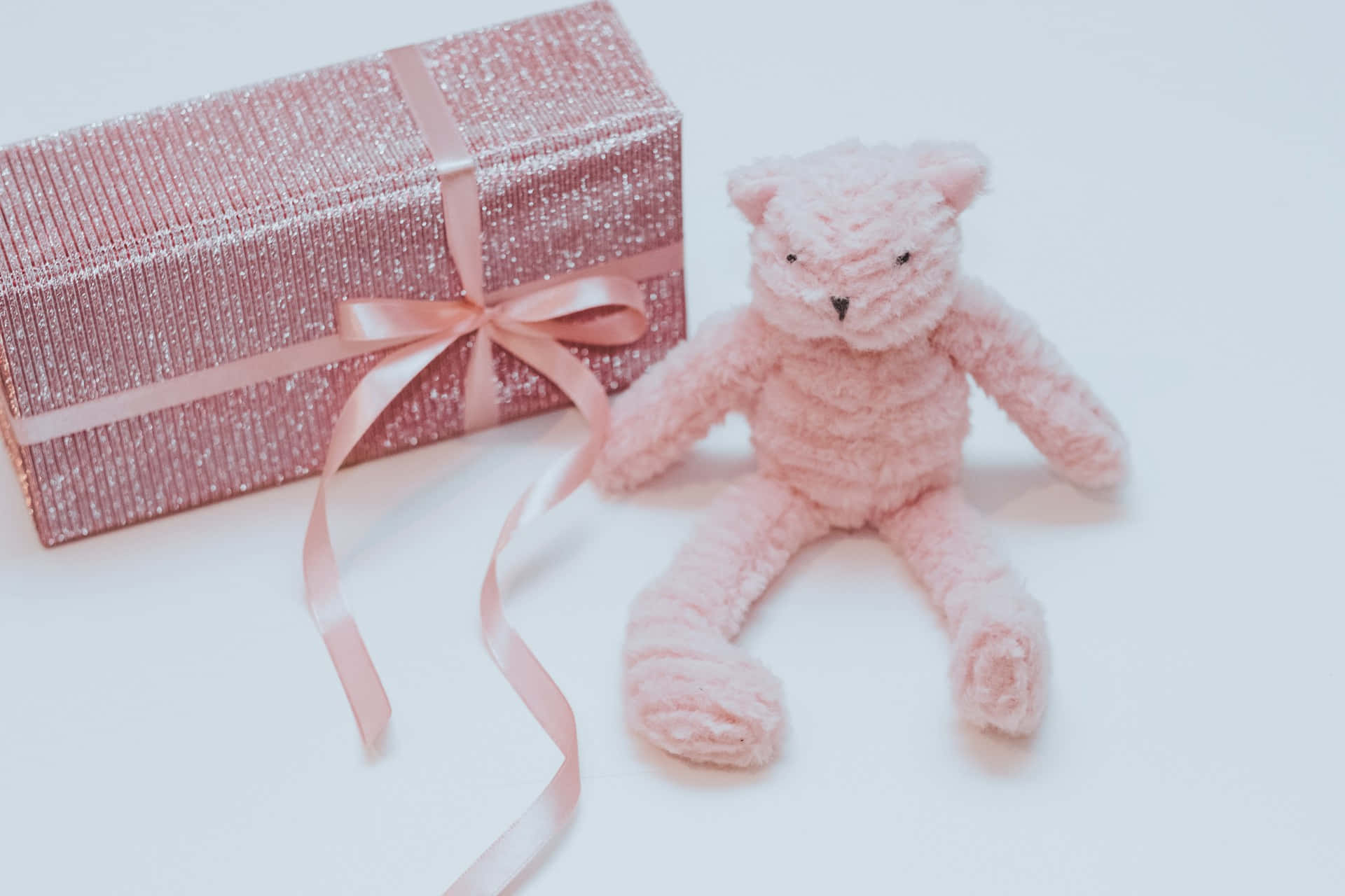 Pink Teddy Bearand Gift Boxwith Bow Wallpaper