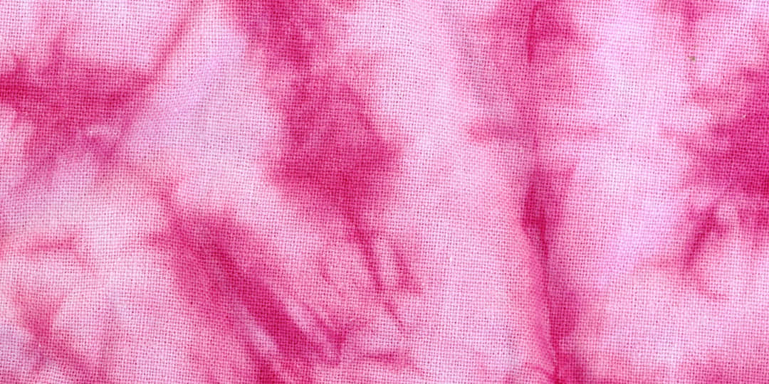“Vibrant and stylish! Show your unique style with this pink tie-dye background.”