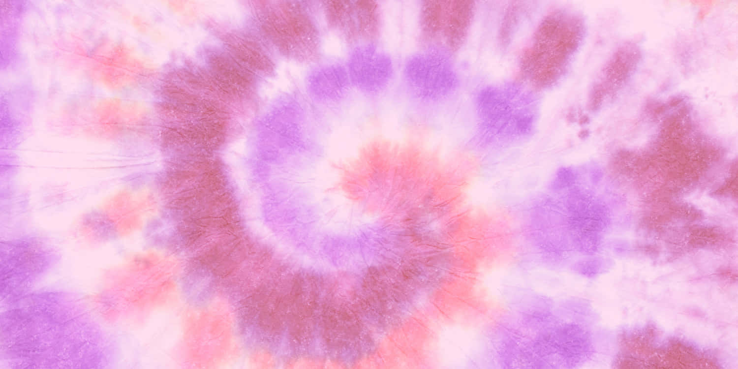 A Purple And Pink Tie Dyed Fabric