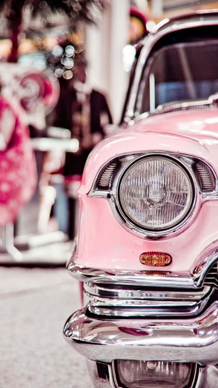 An Eye-catching Pink Vintage Car Wallpaper