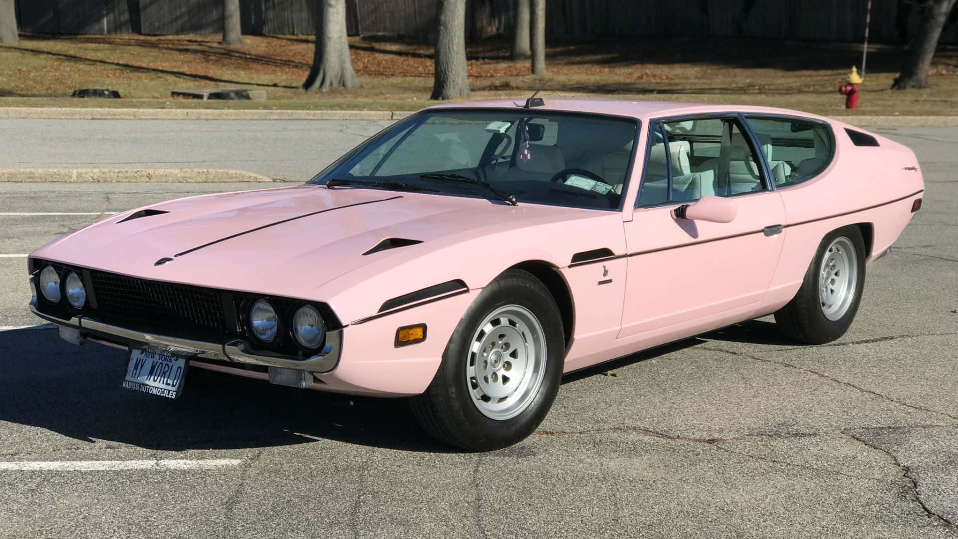 Pink Vintage Sports Car Wallpaper