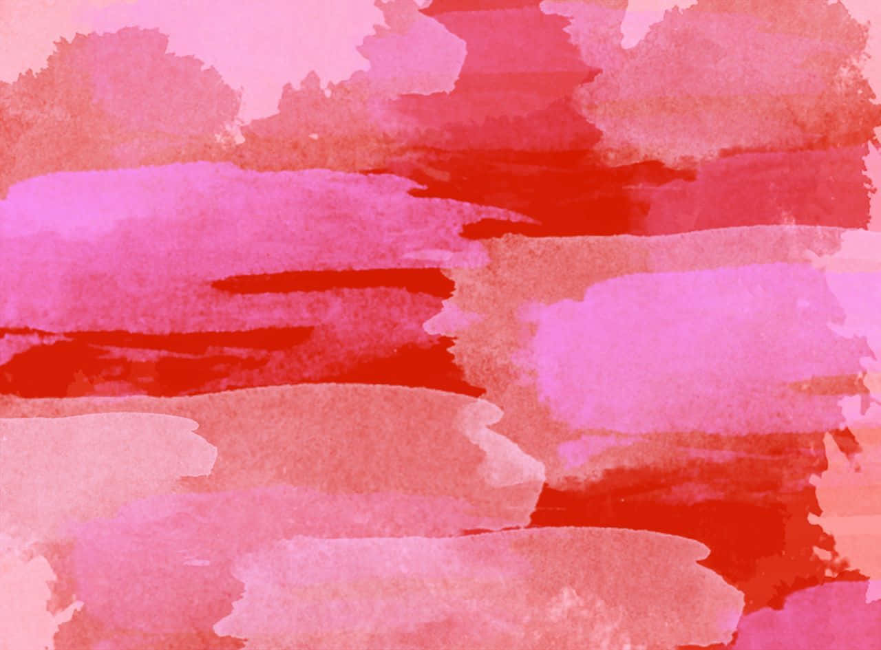 Pink paint swirls blend together to create a mesmerizing watercolor painting Wallpaper