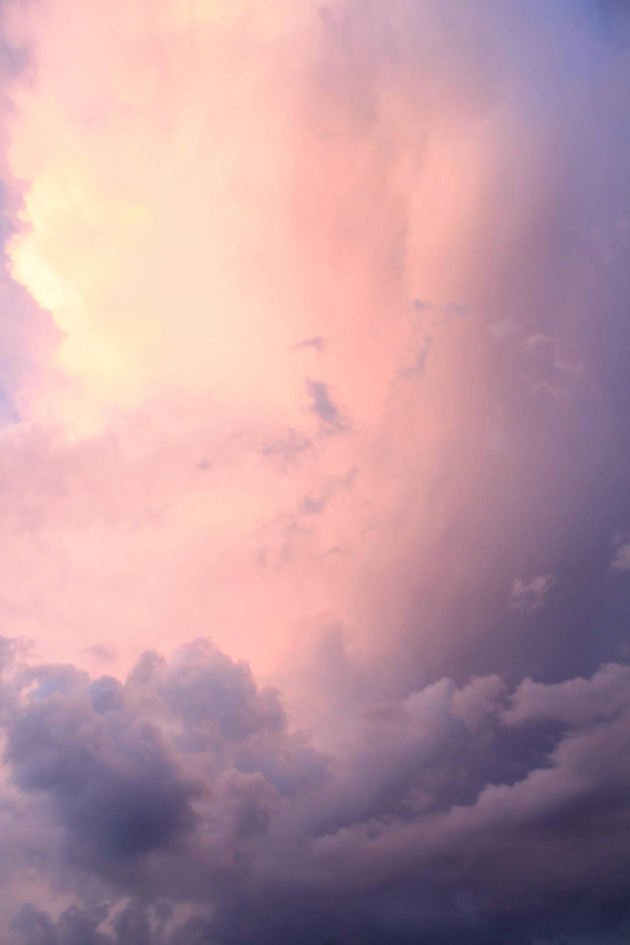 Take a breath and enjoy the beauty of the bright pink ombre clouds Wallpaper