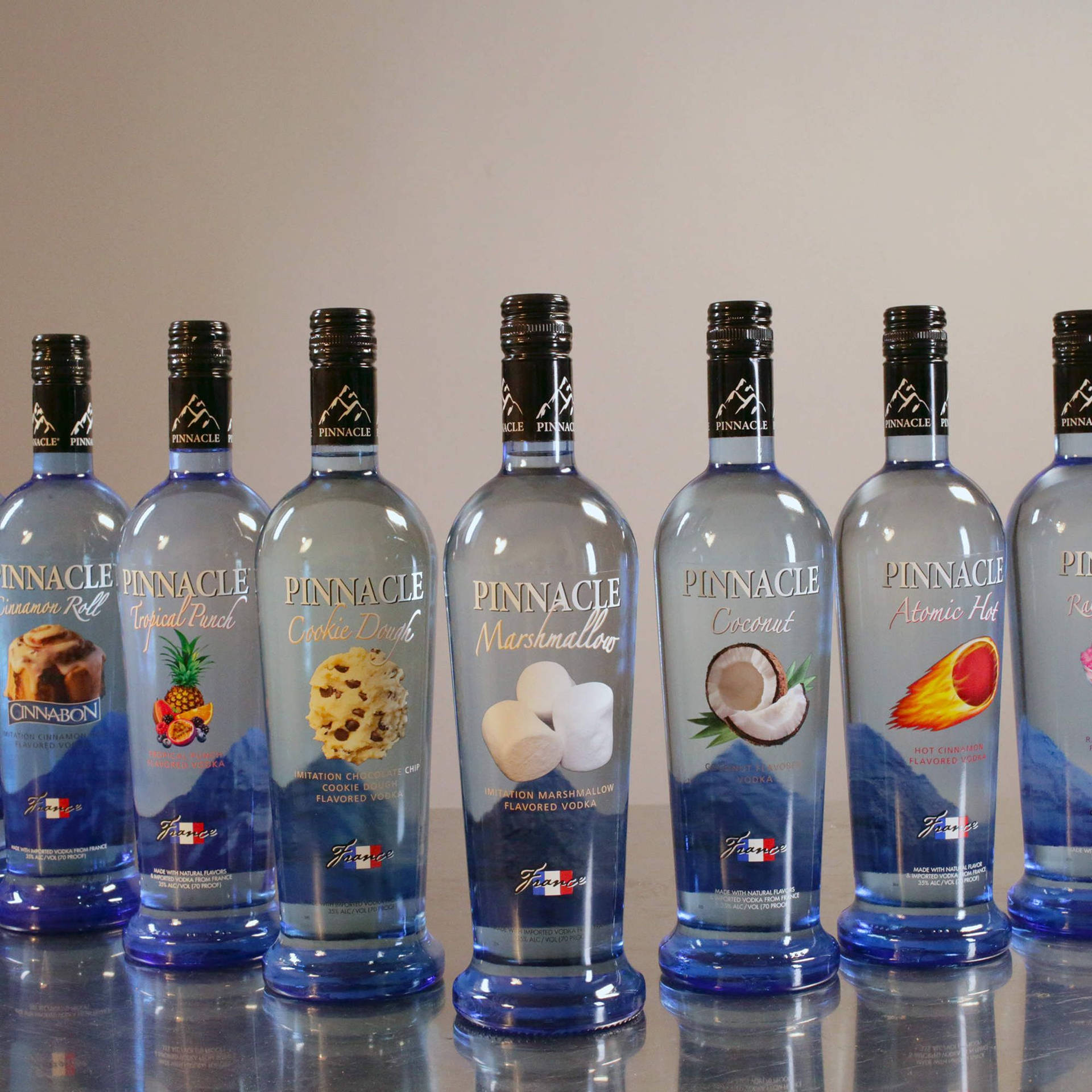 Pinnacle Vodka Different Flavored Bottles Wallpaper