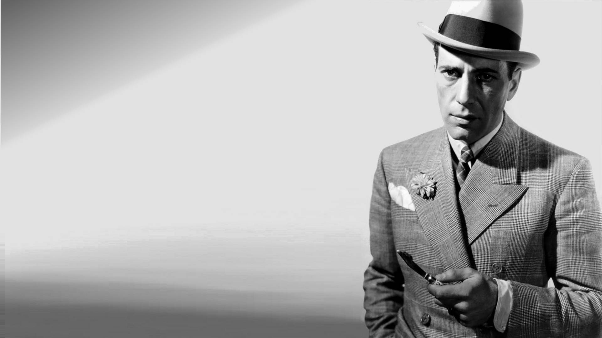 Projicer Humphrey Bogarts ikoniske portræt på din enhed. Wallpaper