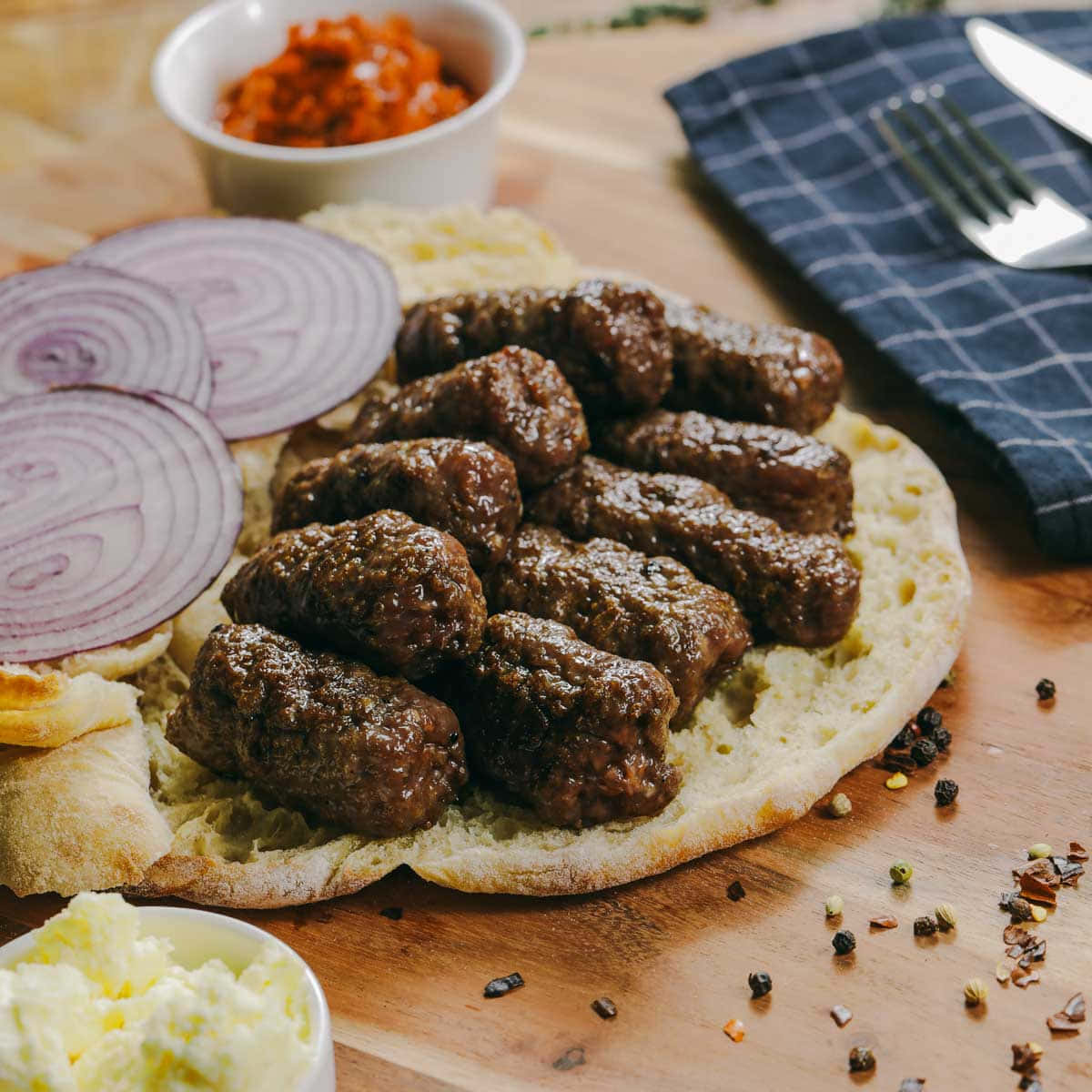 Pita Bread With Layer Of Grilled Ćevapi Sausages Wallpaper