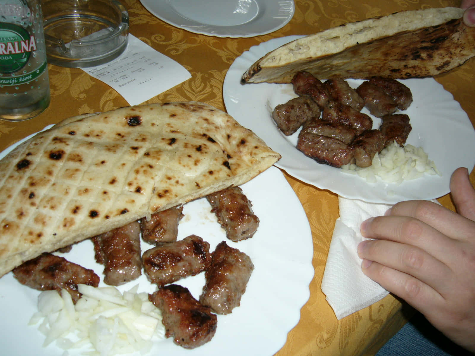 Pita Bread With Slices Of Ćevapi Sausages Wallpaper