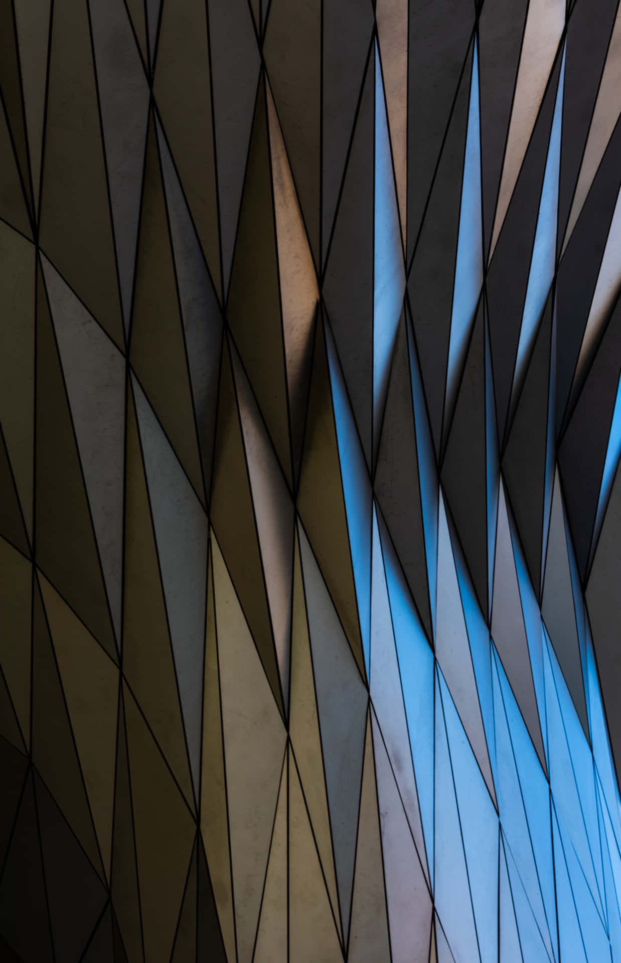 A Building With A Blue And Black Pattern