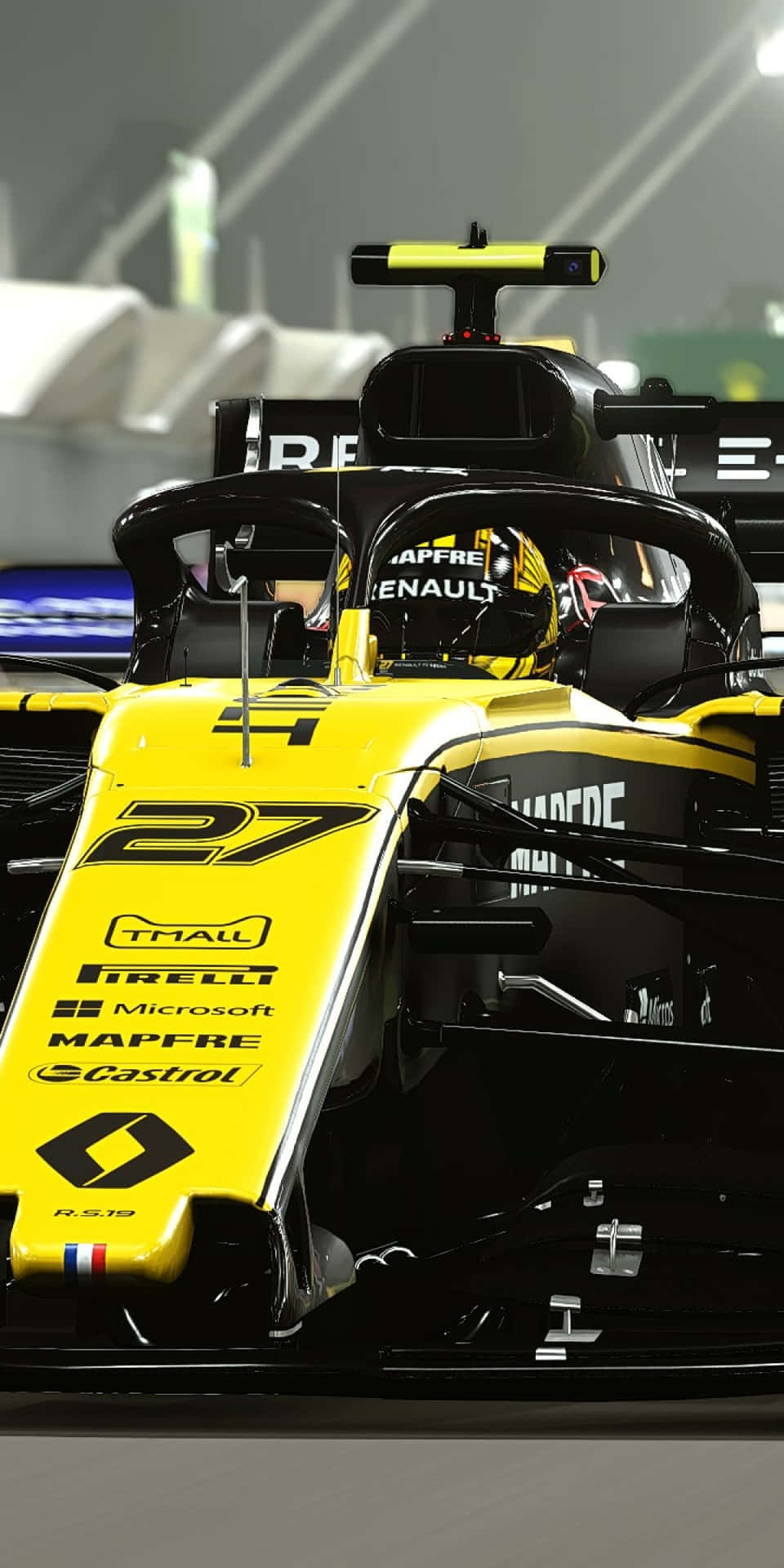 a yellow and black racing car is driving at night
