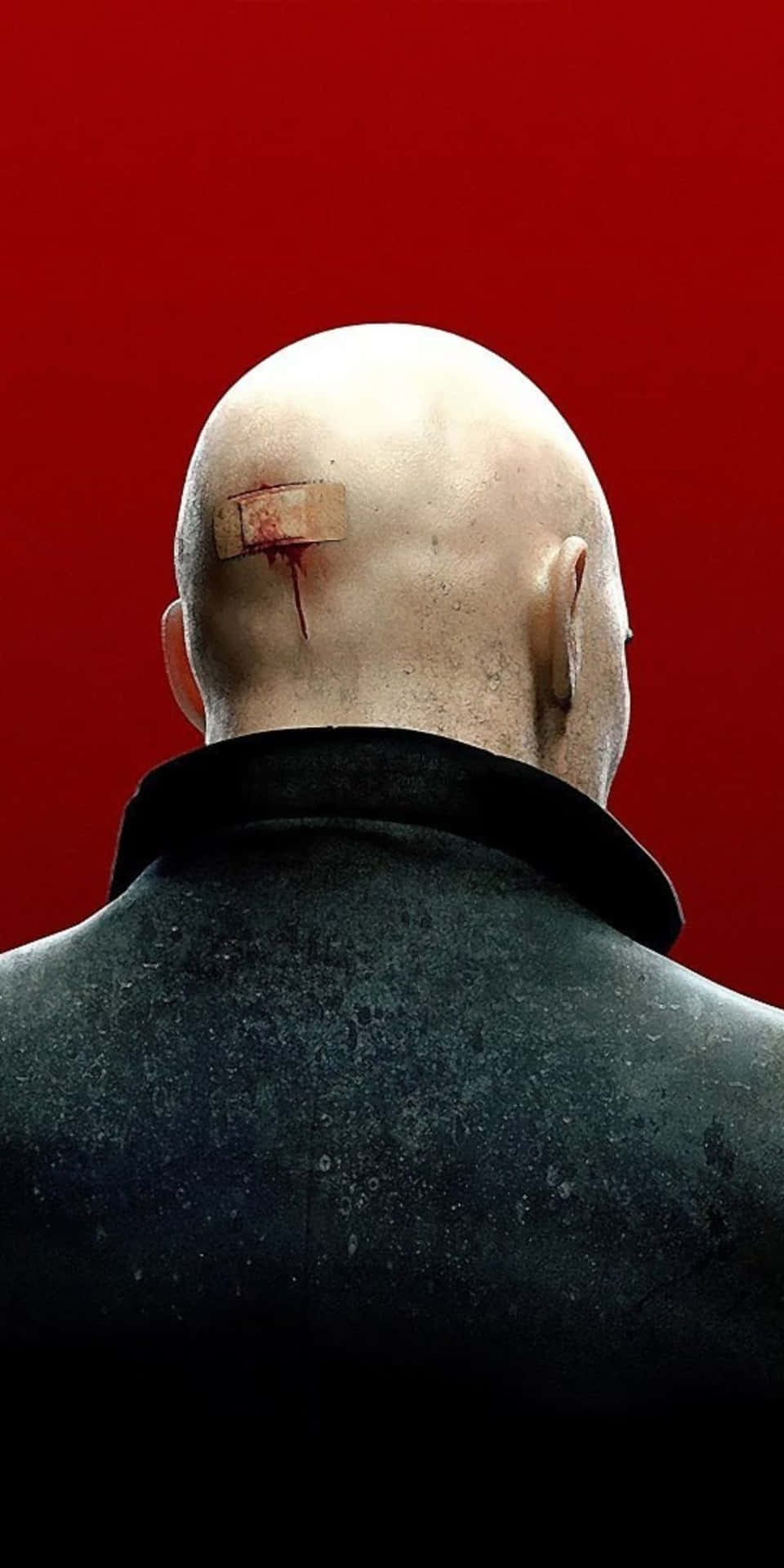 A Man With A Bald Head And Blood On His Head