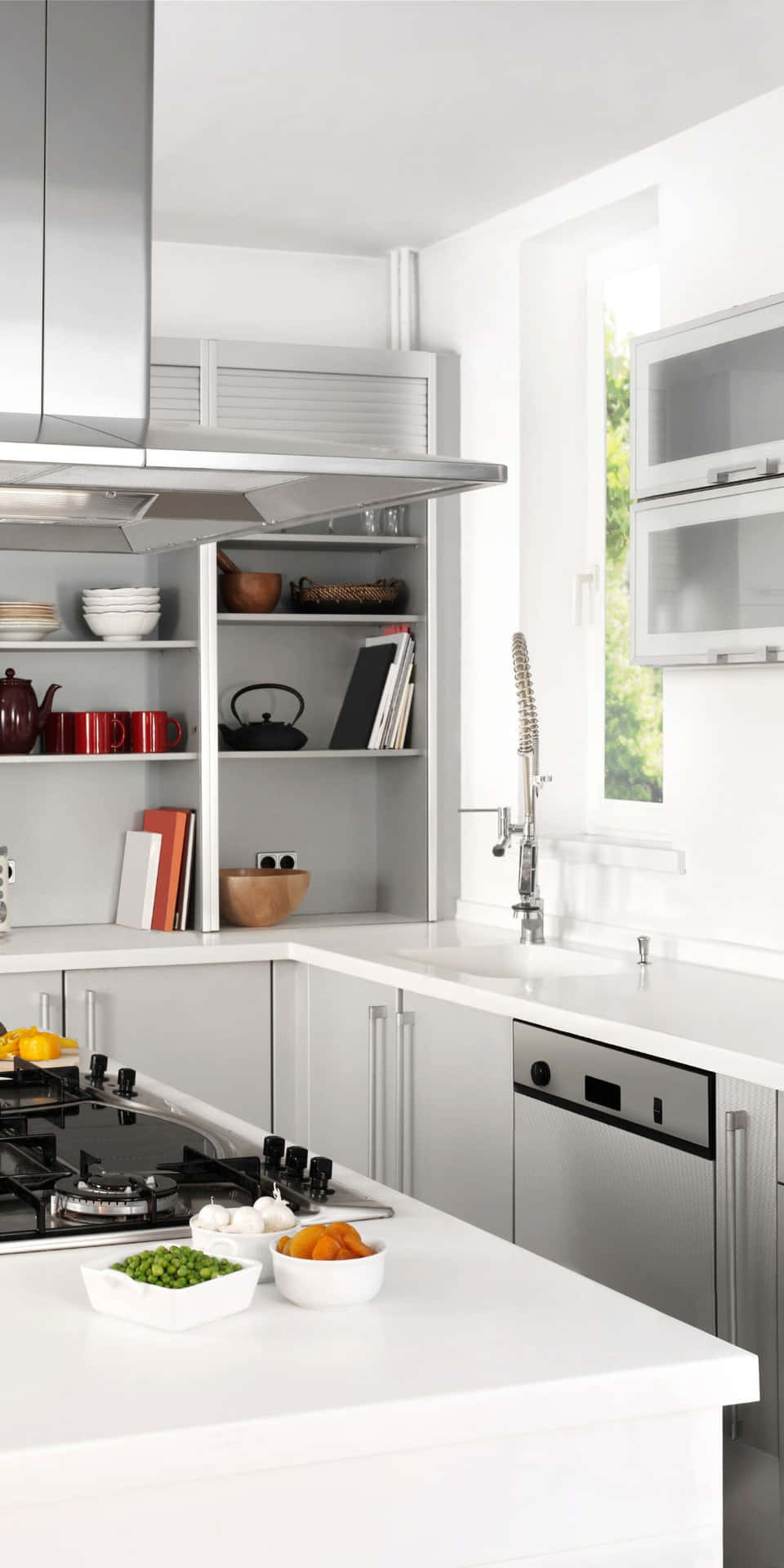 A White Kitchen With A Stove And Oven