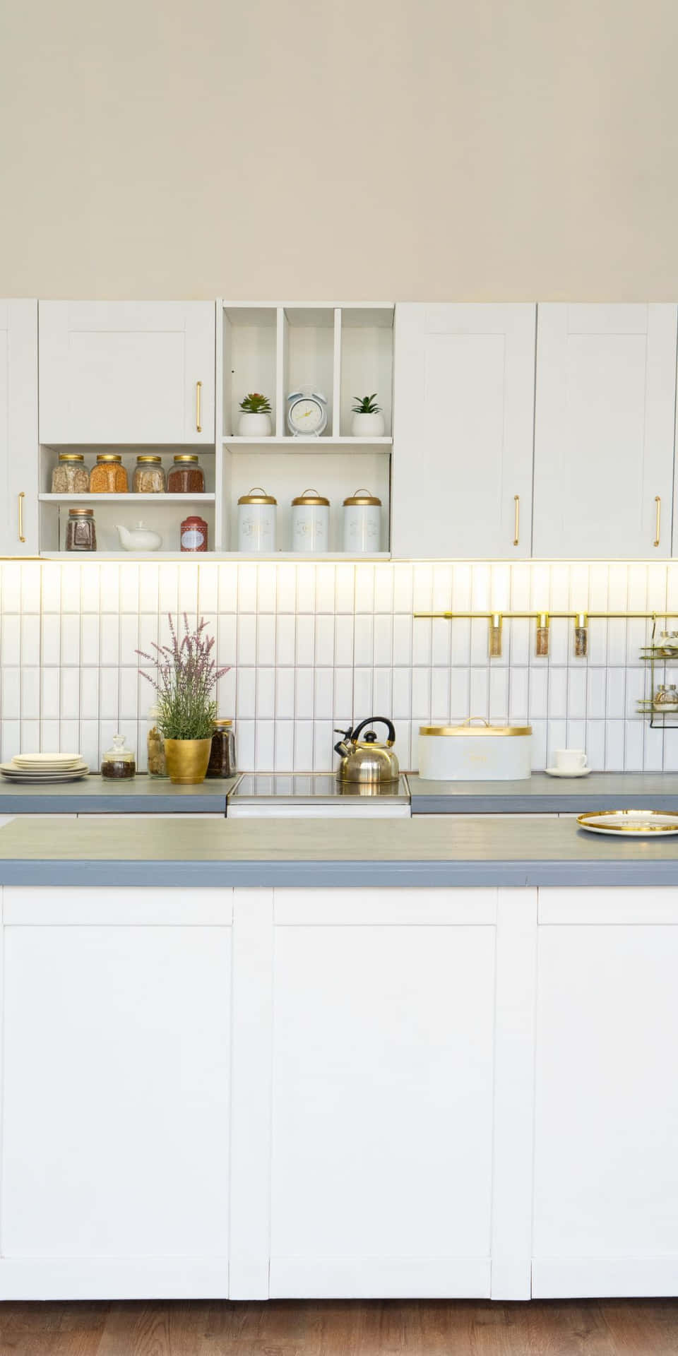 A White Kitchen With A Wooden Counter Top