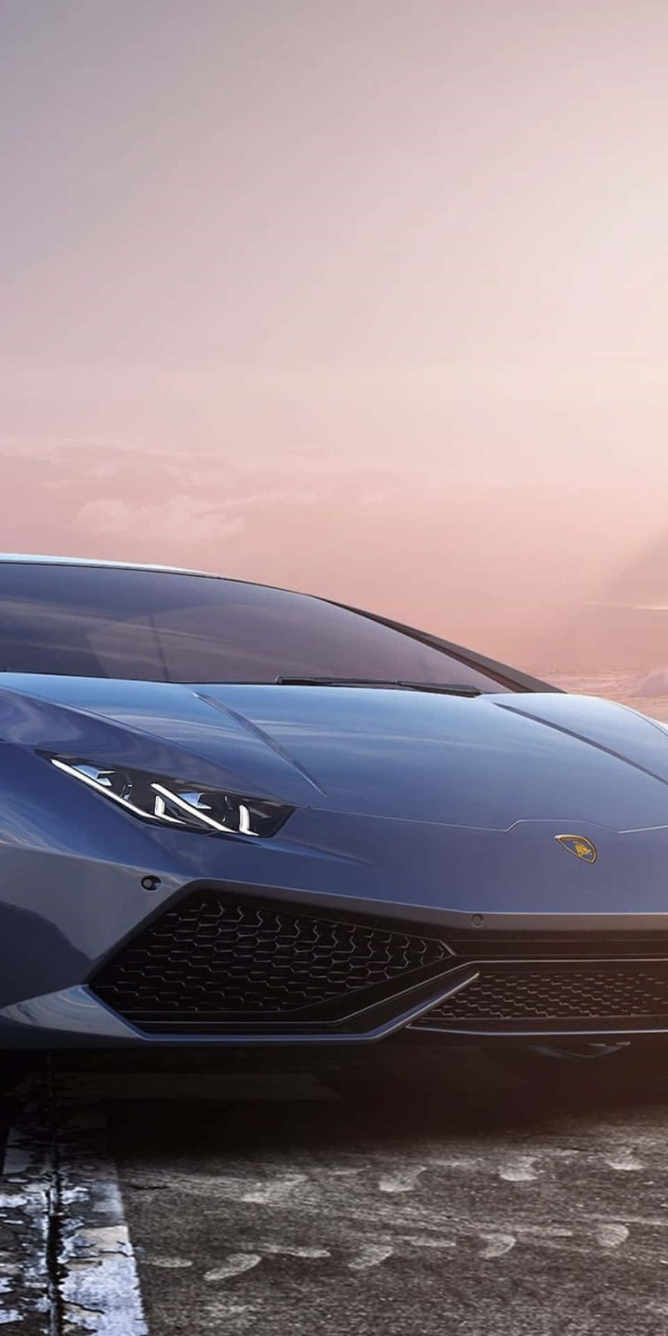 The Lamborghini Huracan Is Shown In The Sunset