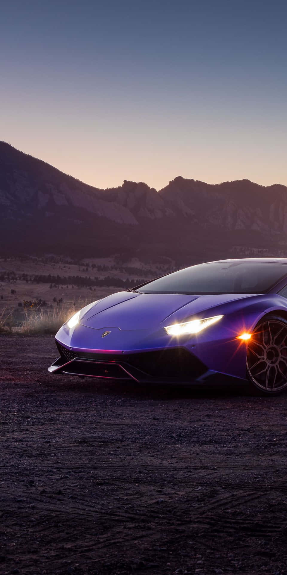 The Lamborghini Huracan Is Parked In The Desert