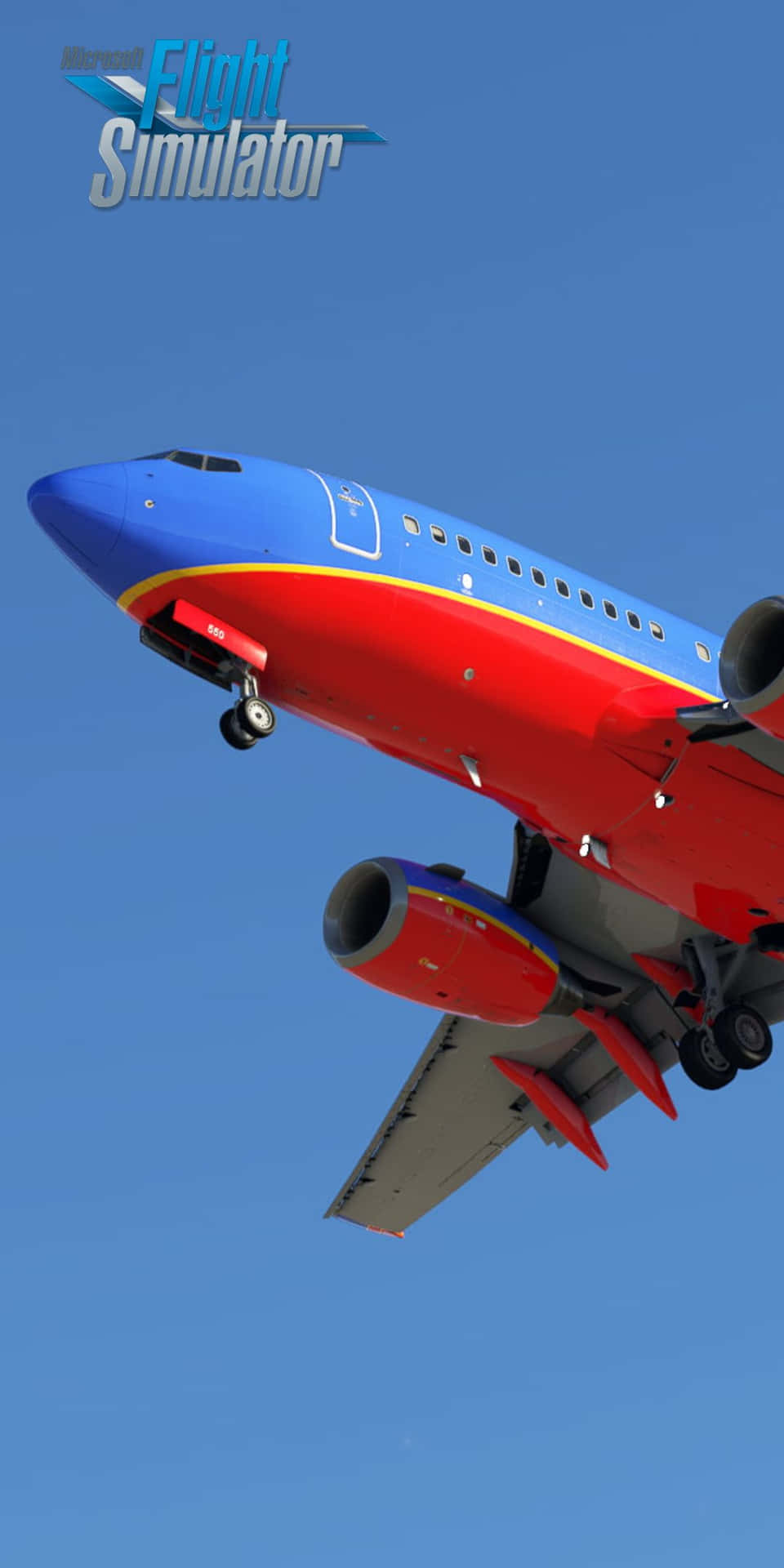 A Blue And Red Airplane Flying In The Sky