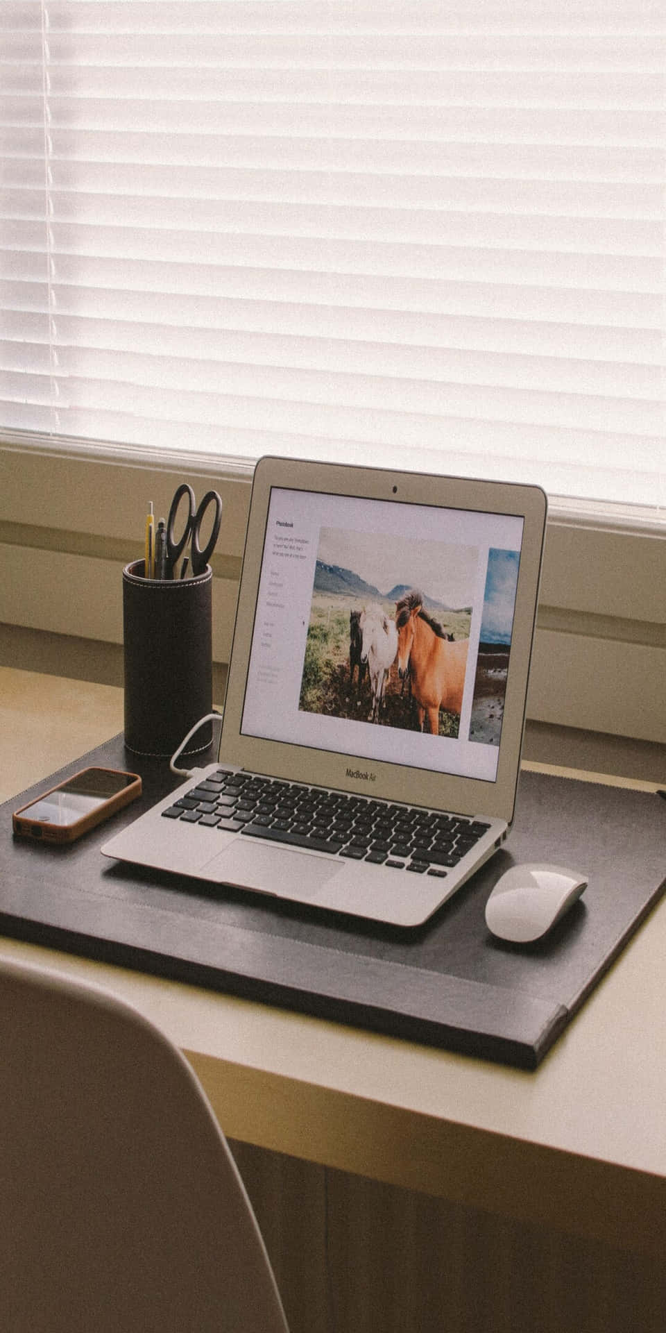 A Laptop On A Desk