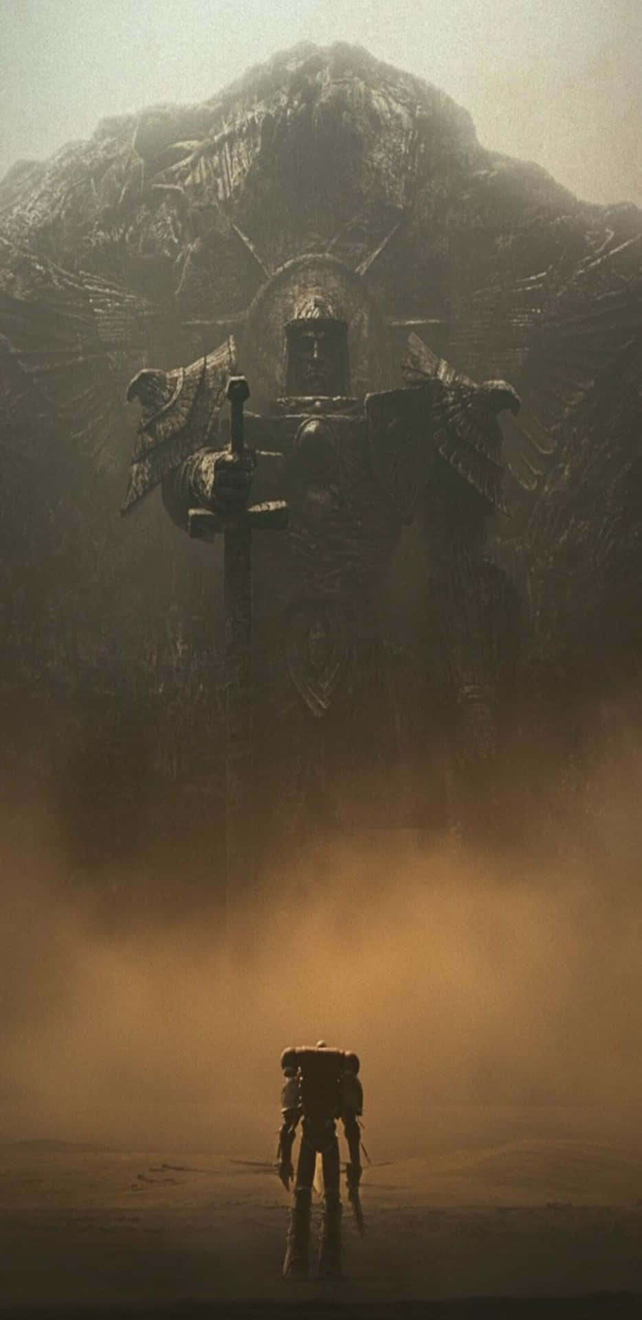 A Giant Robot Standing In Front Of A Mountain