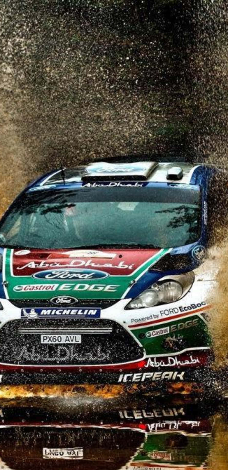 Ford Rally Car Driving Through Mud