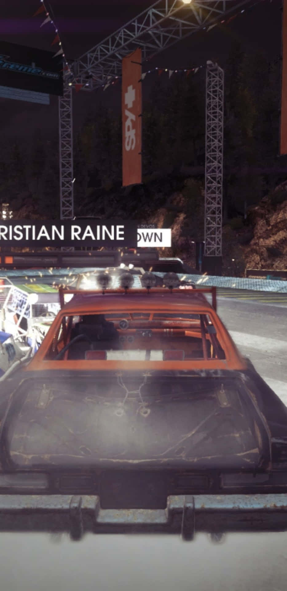 A Car Driving Down A Track With The Words Christian Raine