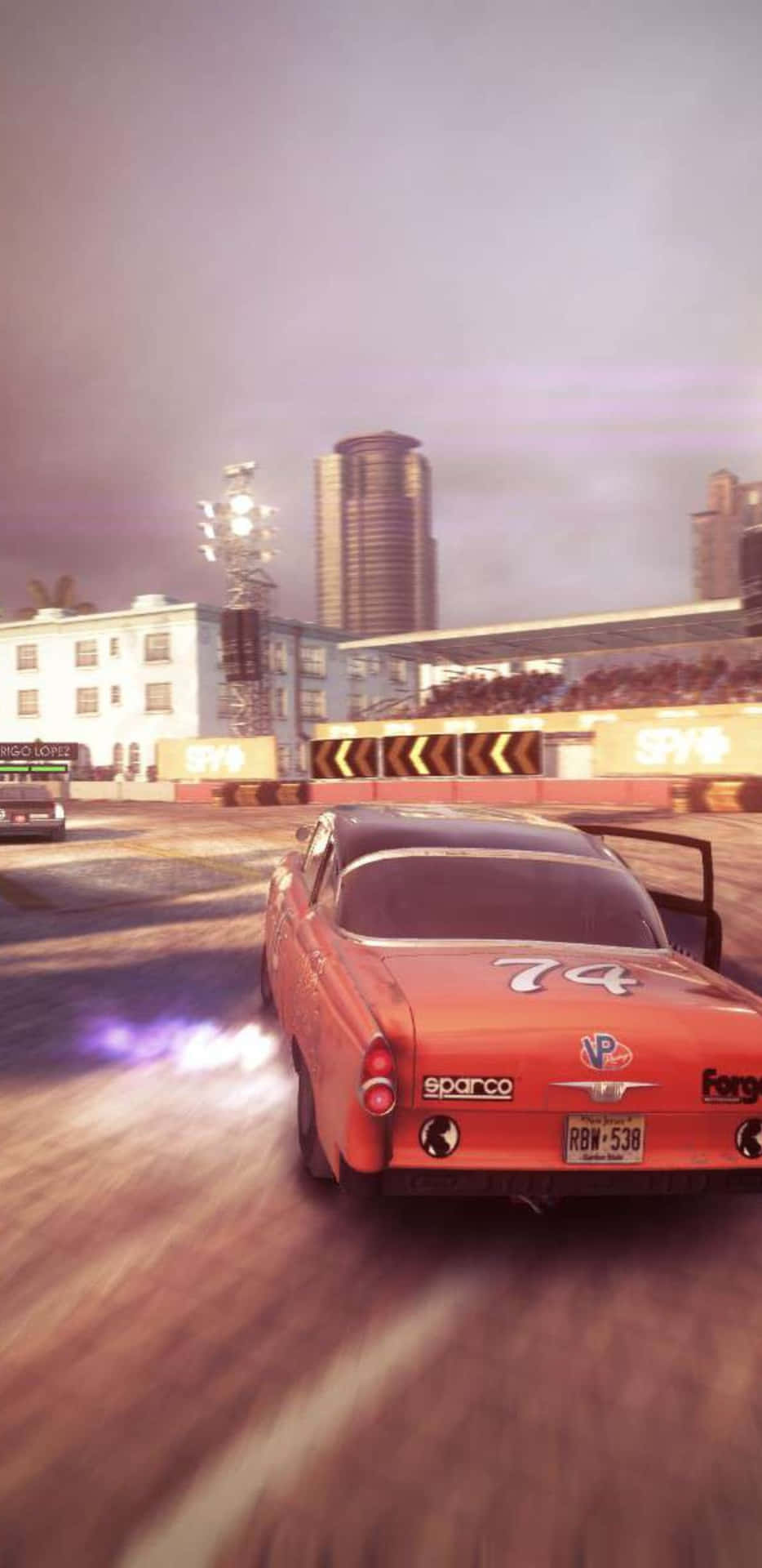 A Screenshot Of A Racing Game With A Red Car