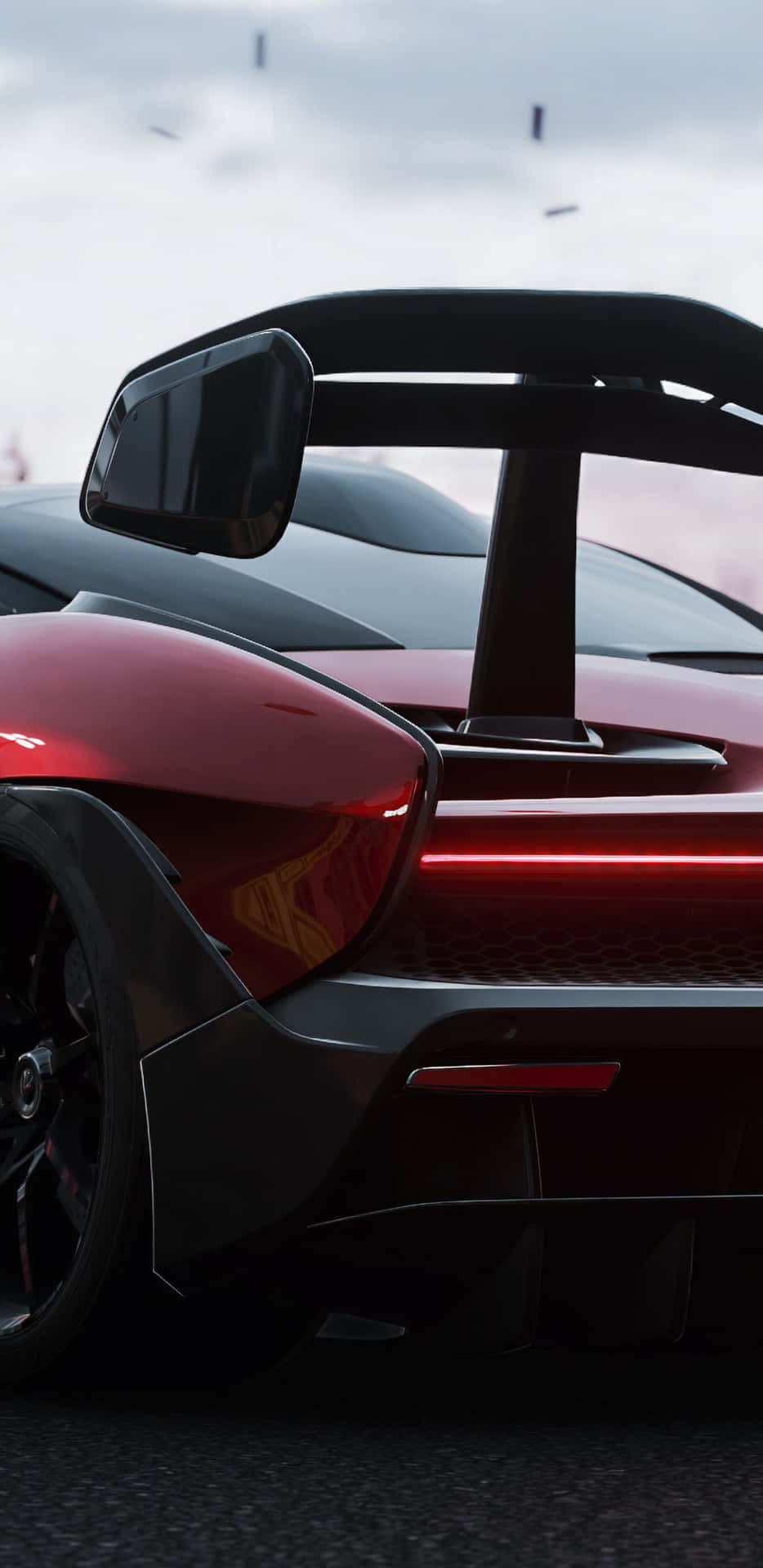 A Red And Black Sports Car With A Rear View