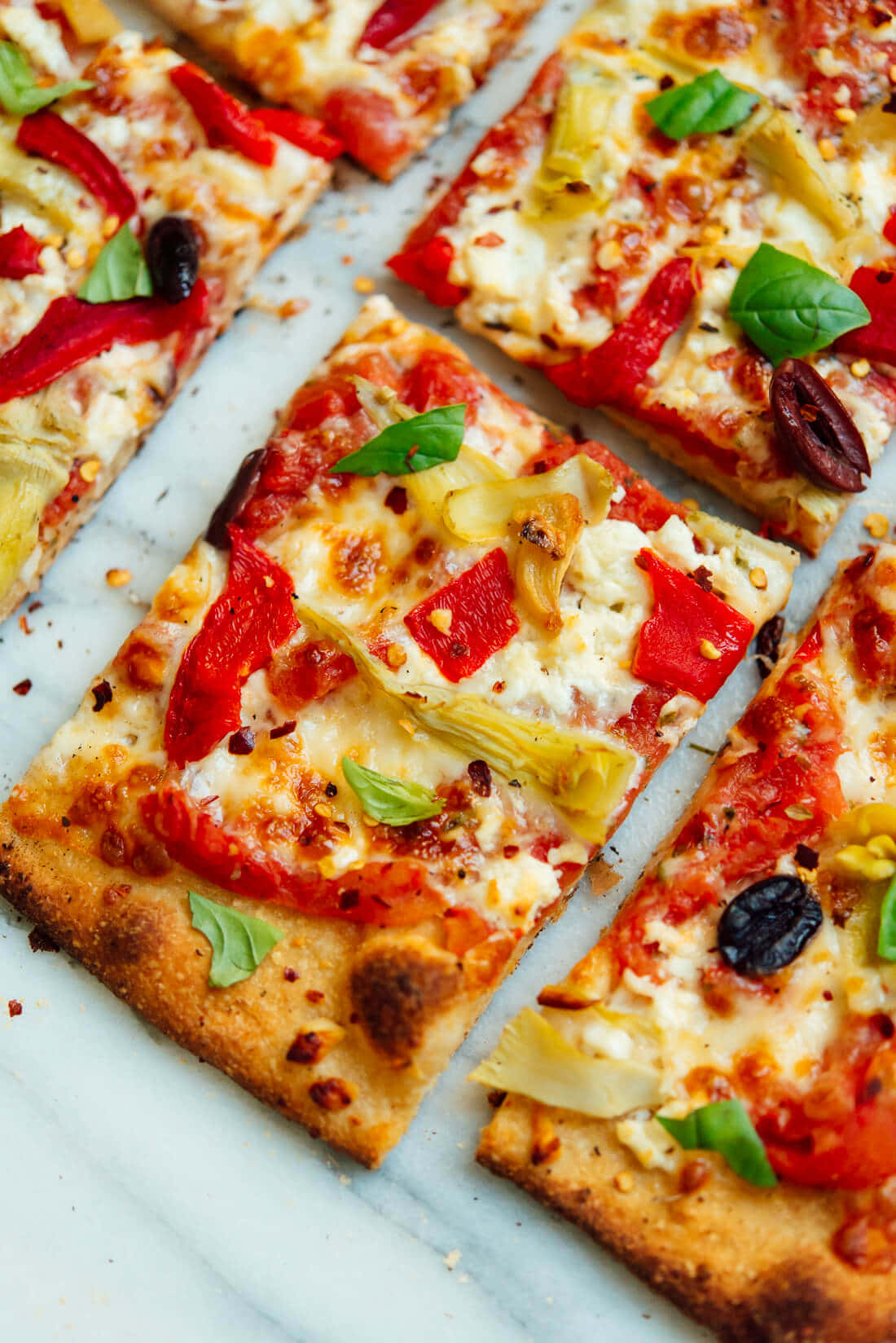 Immaginedi Pizze Quadrate Con Fette E Condimenti
