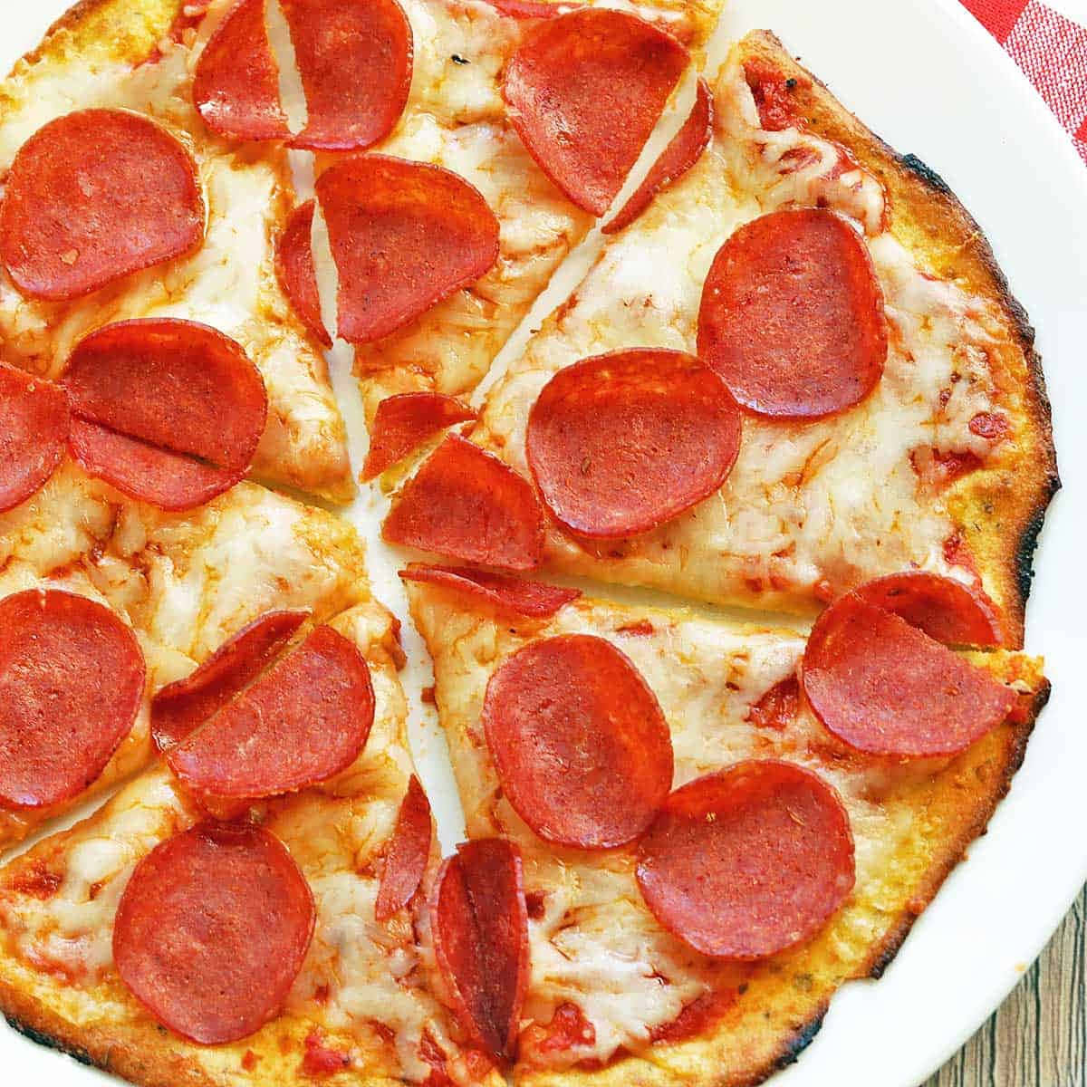 Pizza With Pepperoni Sliced On Plate Picture
