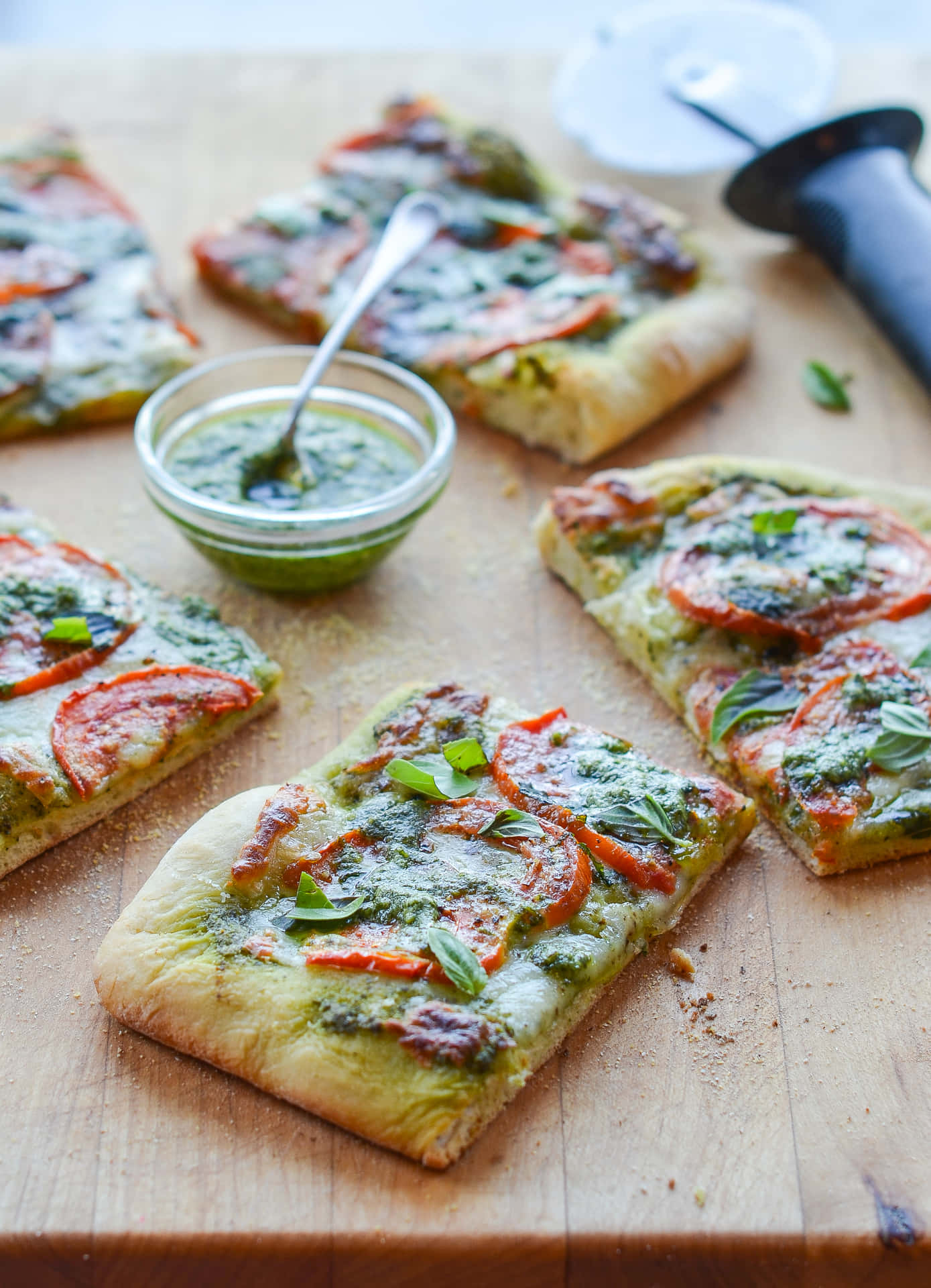 Pizza Slices With Green Sauce Picture