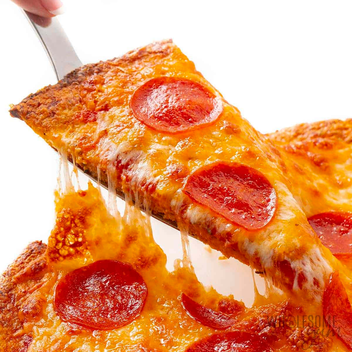 Bildav En Pizzabit Med Pepparoni
