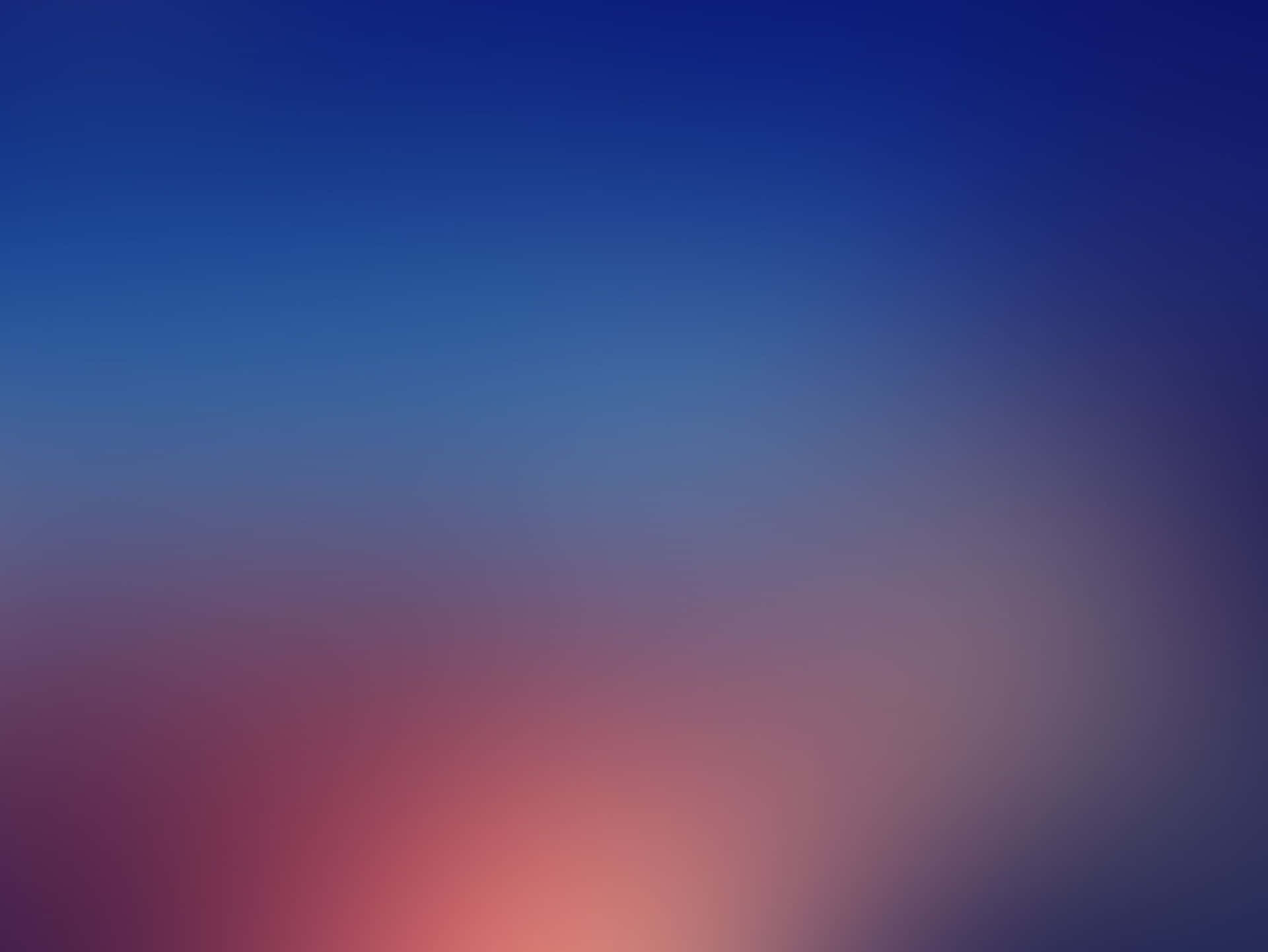 a blurred background with a blue and red color