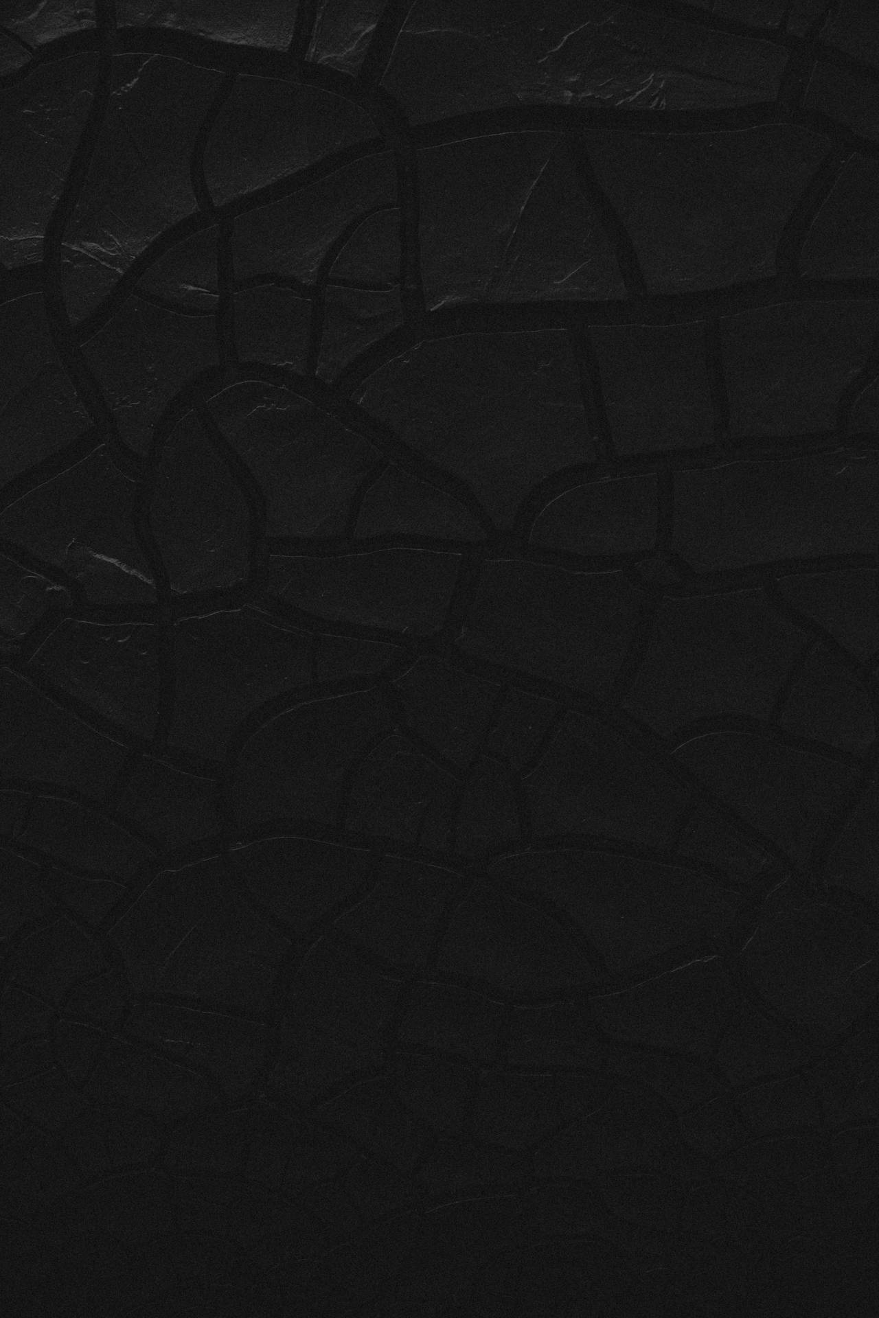 Plain Black With Cracked Surface Wallpaper