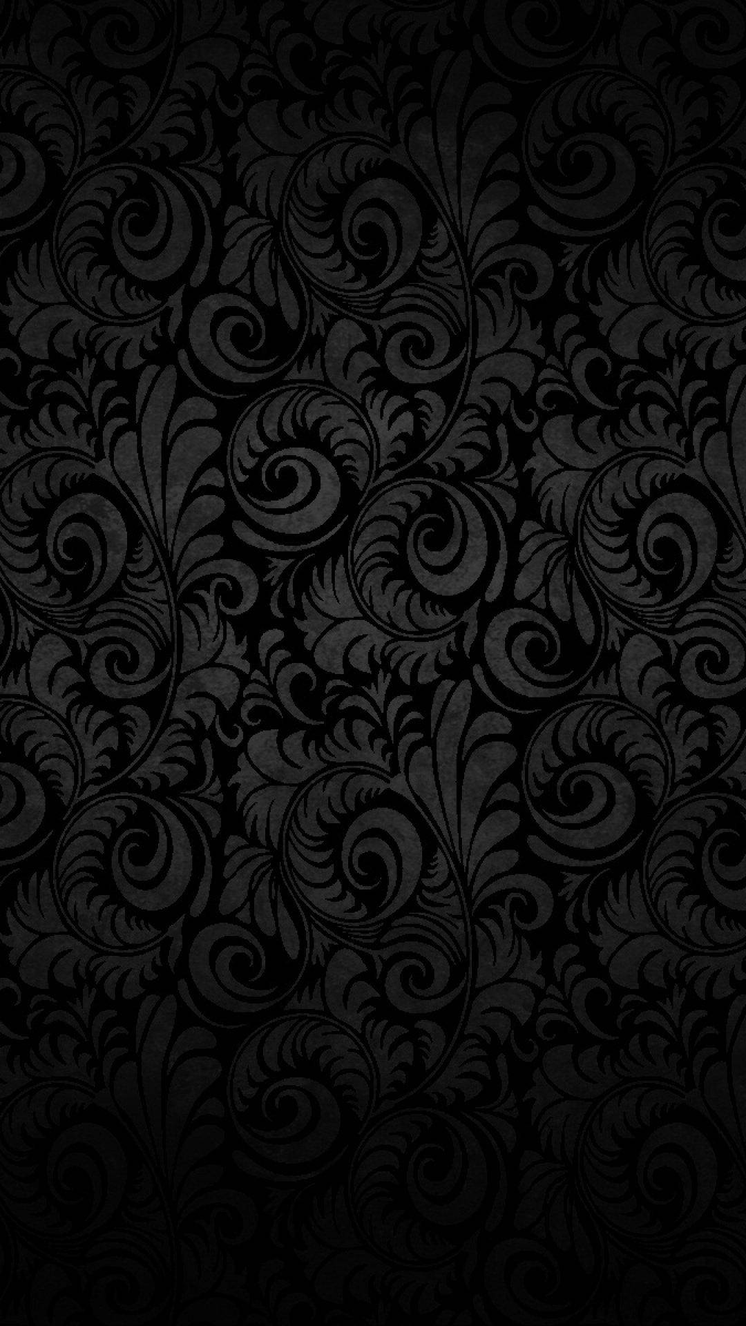 Plain Black With Ornate Leaf Pattern Wallpaper